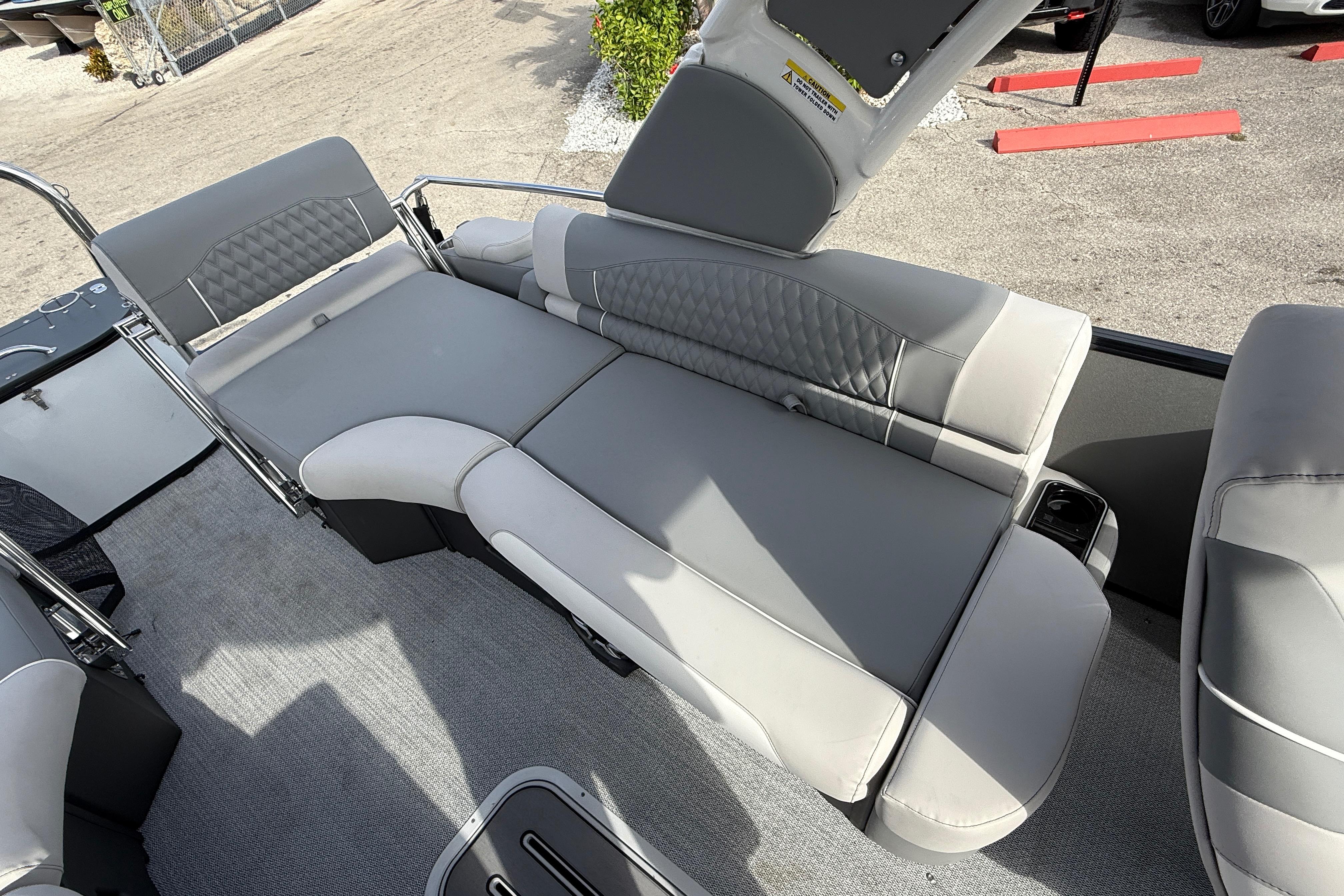 Luxurious seating on 2026 Avalon 2585 Excalibur LTD pontoon boat with Mercury V-10 motor.
