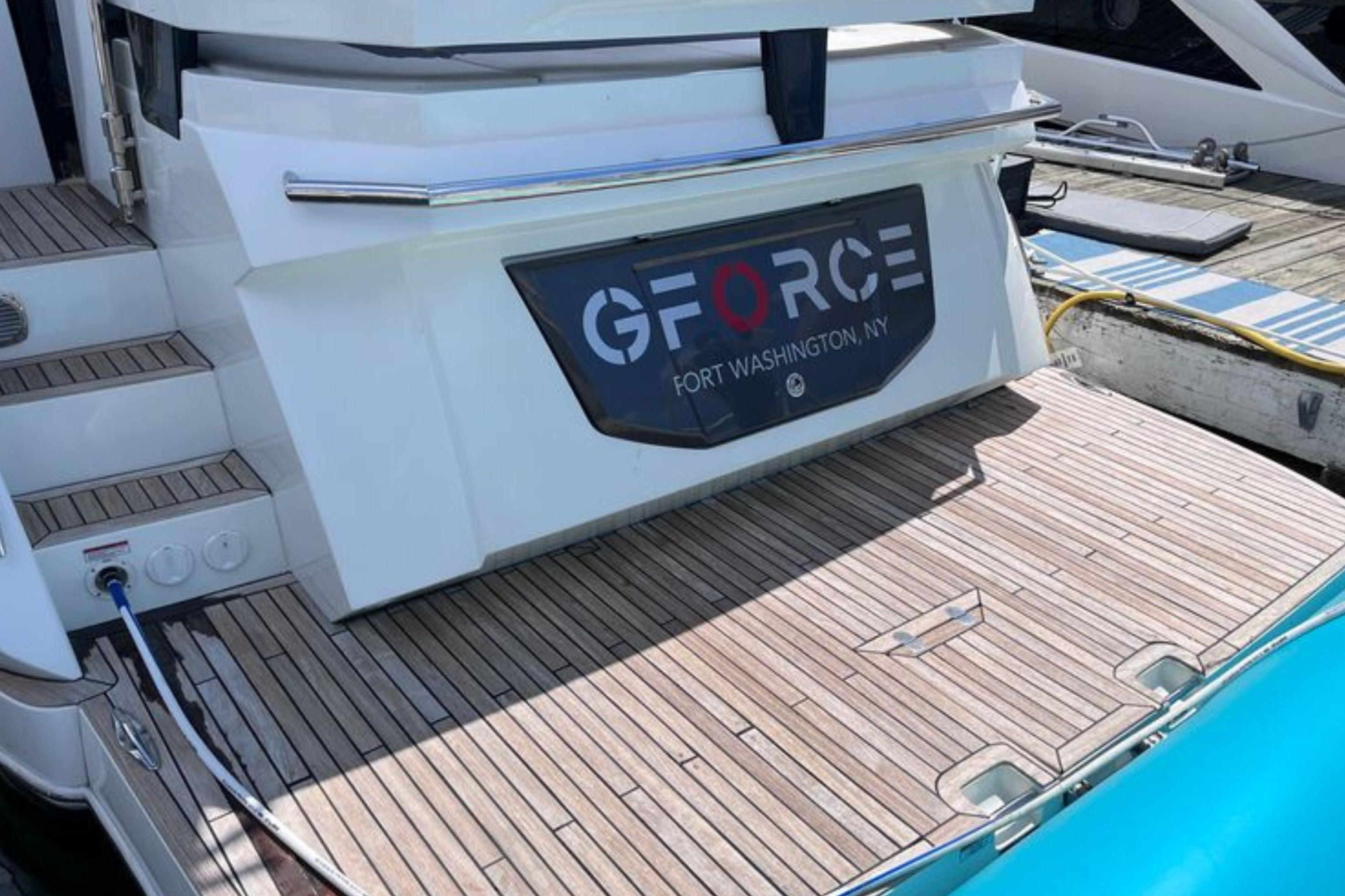 2024 Galeon 425 HTS yacht docked, featuring teak deck and "G-Force" signage.