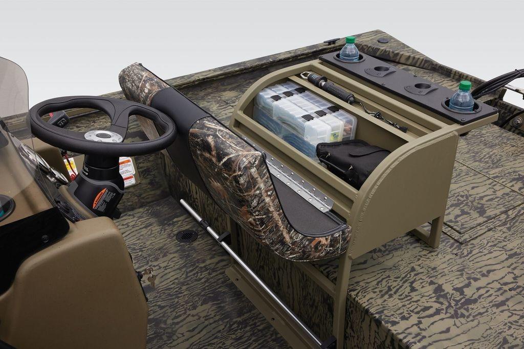 2026 Tracker GRIZZLY® 2072 CC Sportsman boat interior with camo design and organized storage.