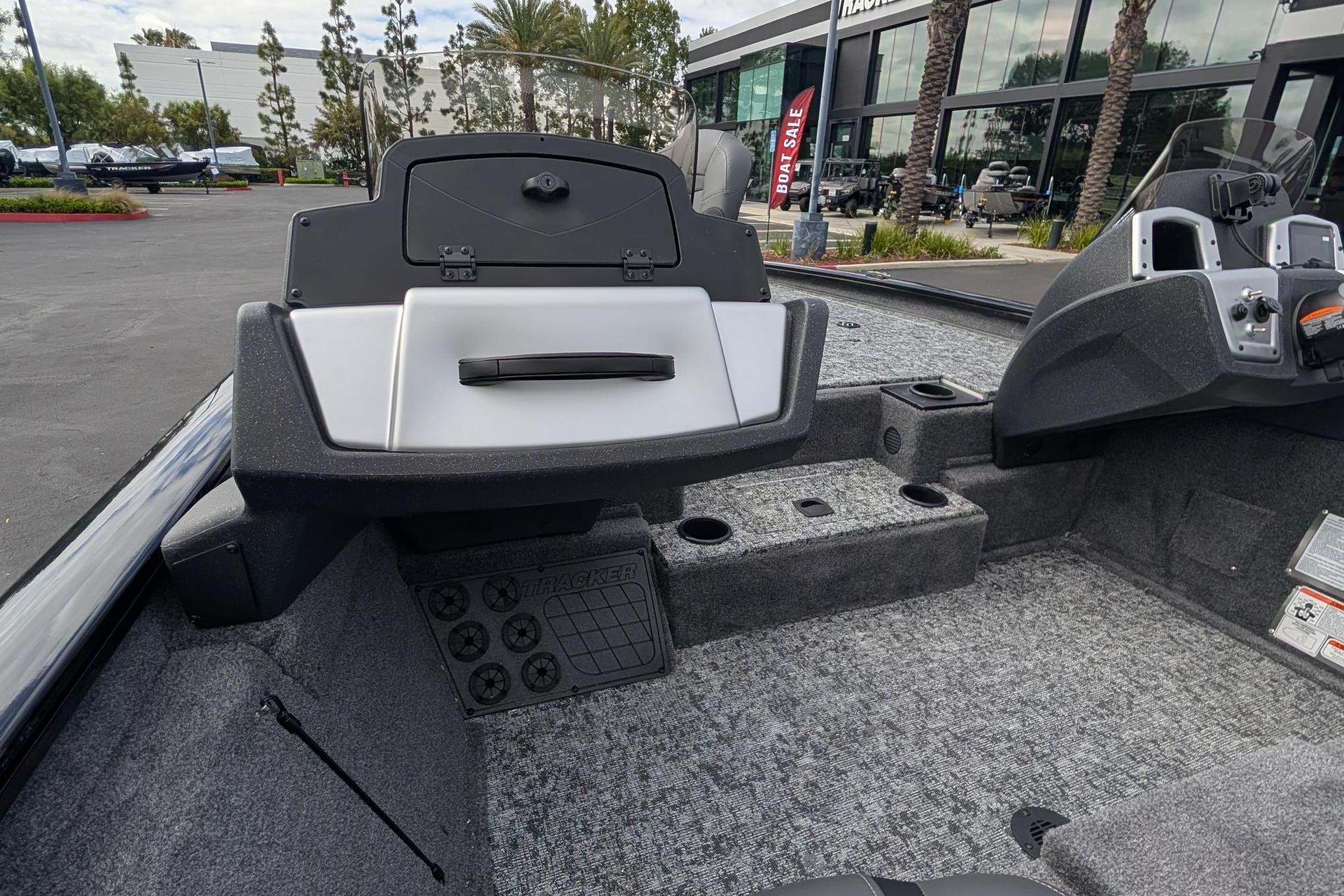 Interior view of a 2026 Tracker Pro Team 195 boat at a dealership.