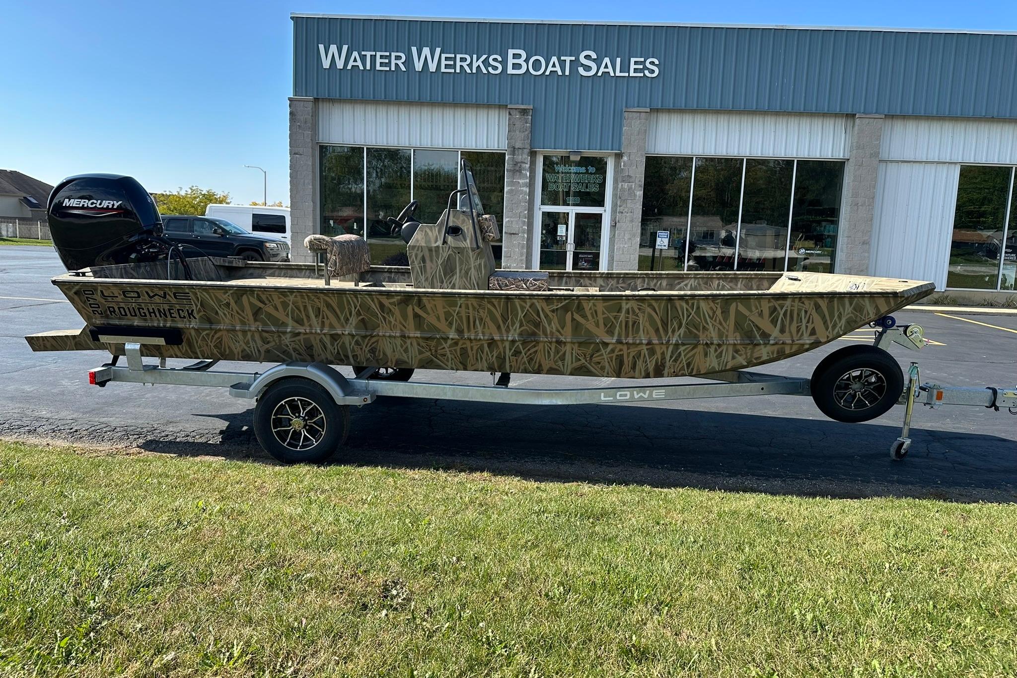 2026 Lowe Roughneck 2070CC boat on trailer outside Water Werks Boat Sales.