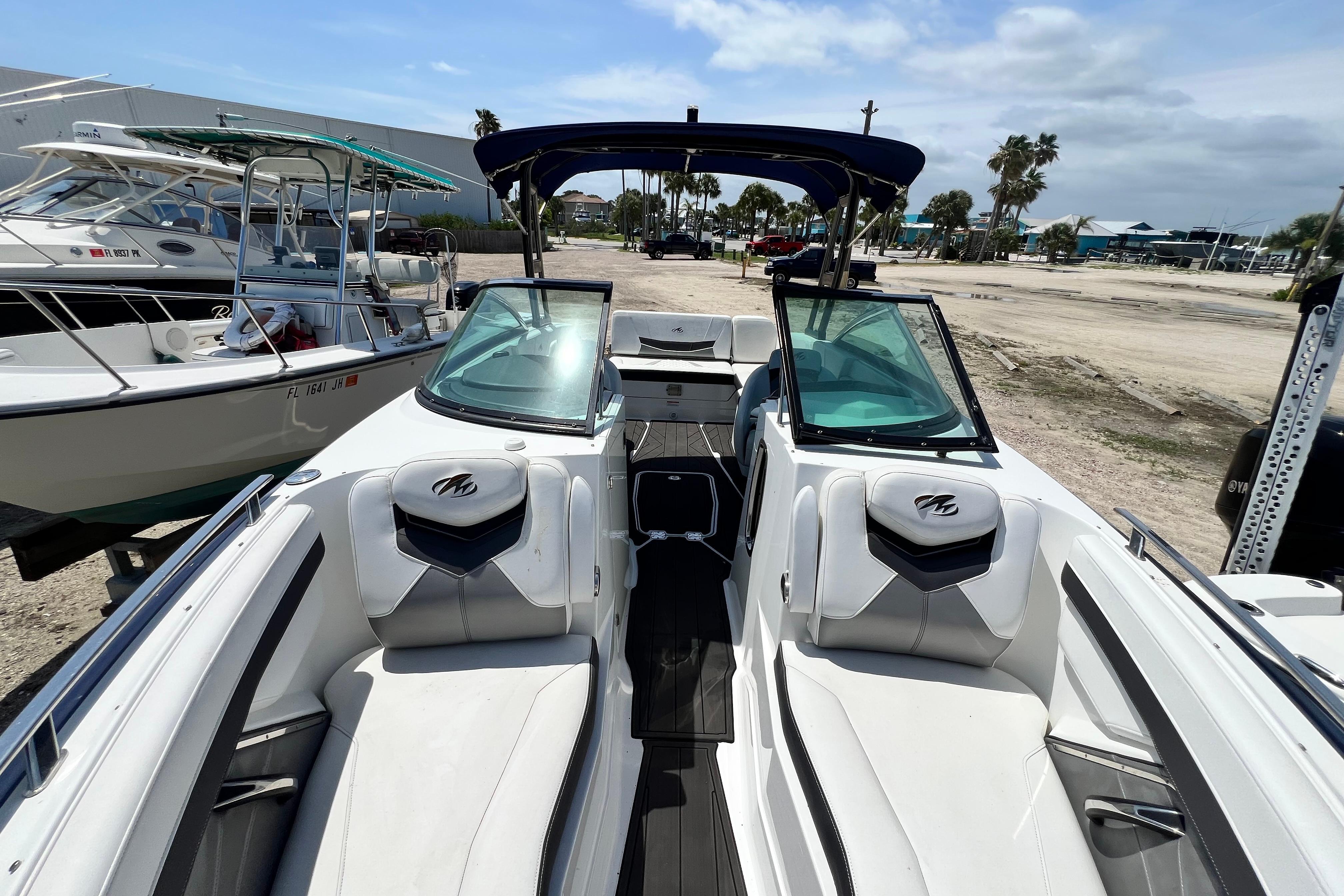 2015 Monterey 268SS Super Sport boat with sleek interior and dual windshields.