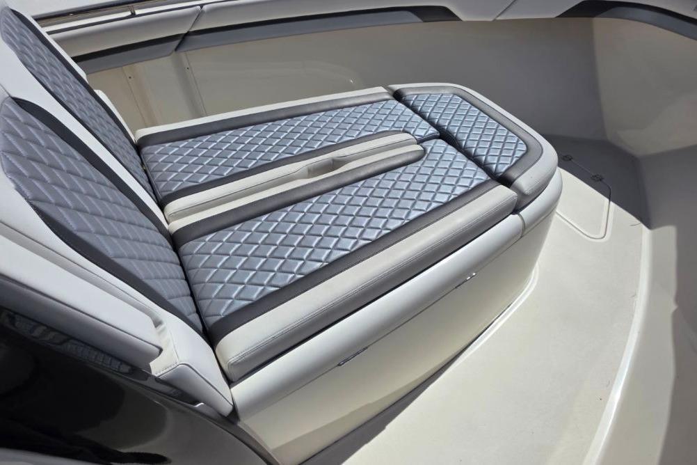 2024 Blackwood 290 boat with luxurious quilted seating in a sleek design.