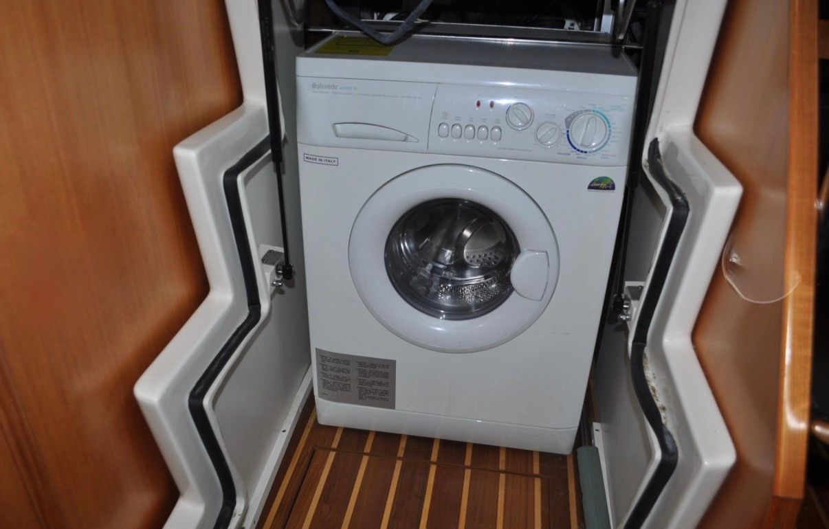 Washing machine in the cabin of a 2005 Tiara Yachts 5200 Sovran.