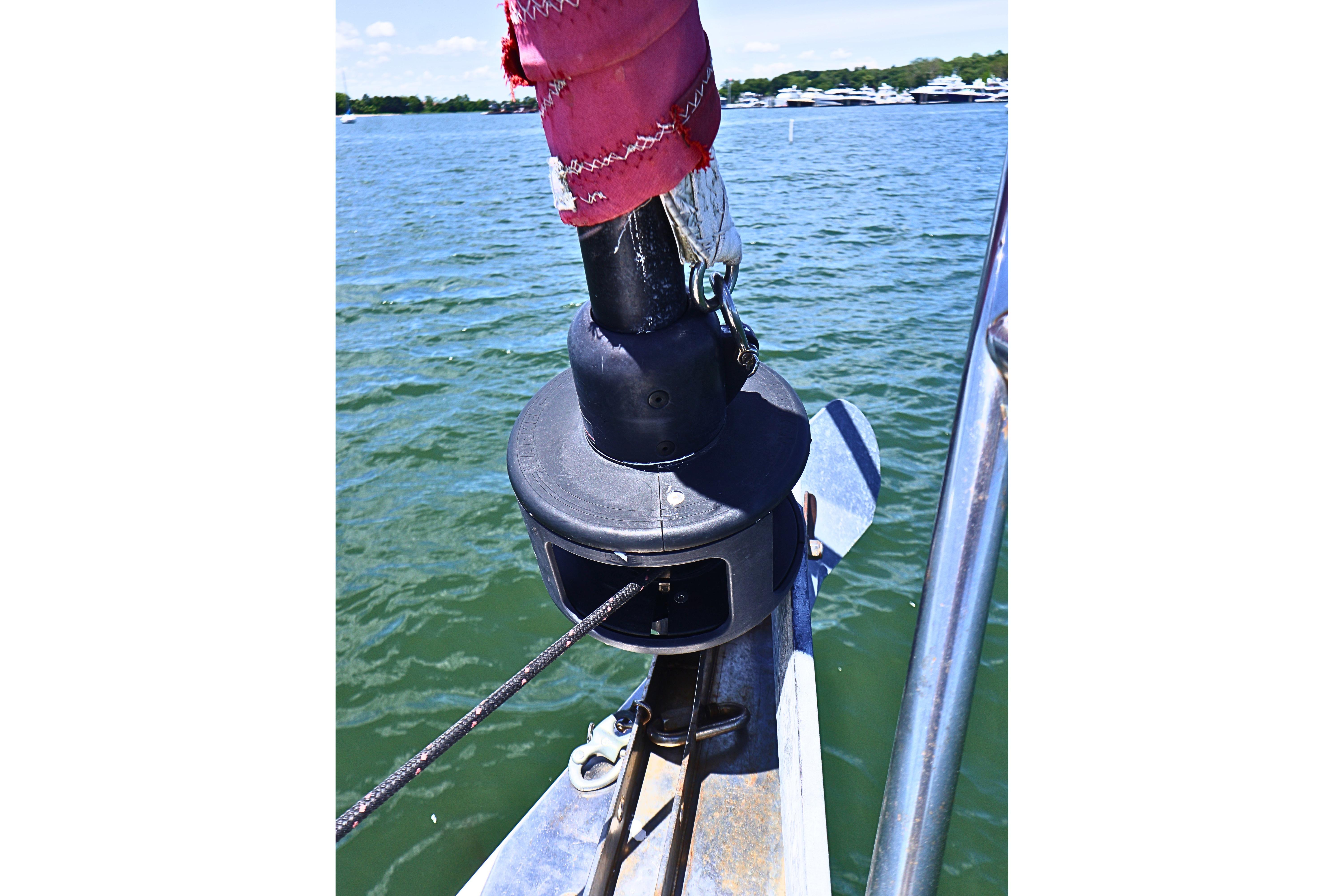 Close-up of a 1989 J Boat J 40 sailboat's furling system on a sunny day.