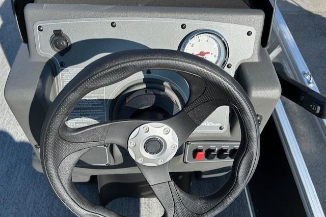 Steering console of 2026 Sun Tracker Bass Buggy 16 XL Select pontoon boat.