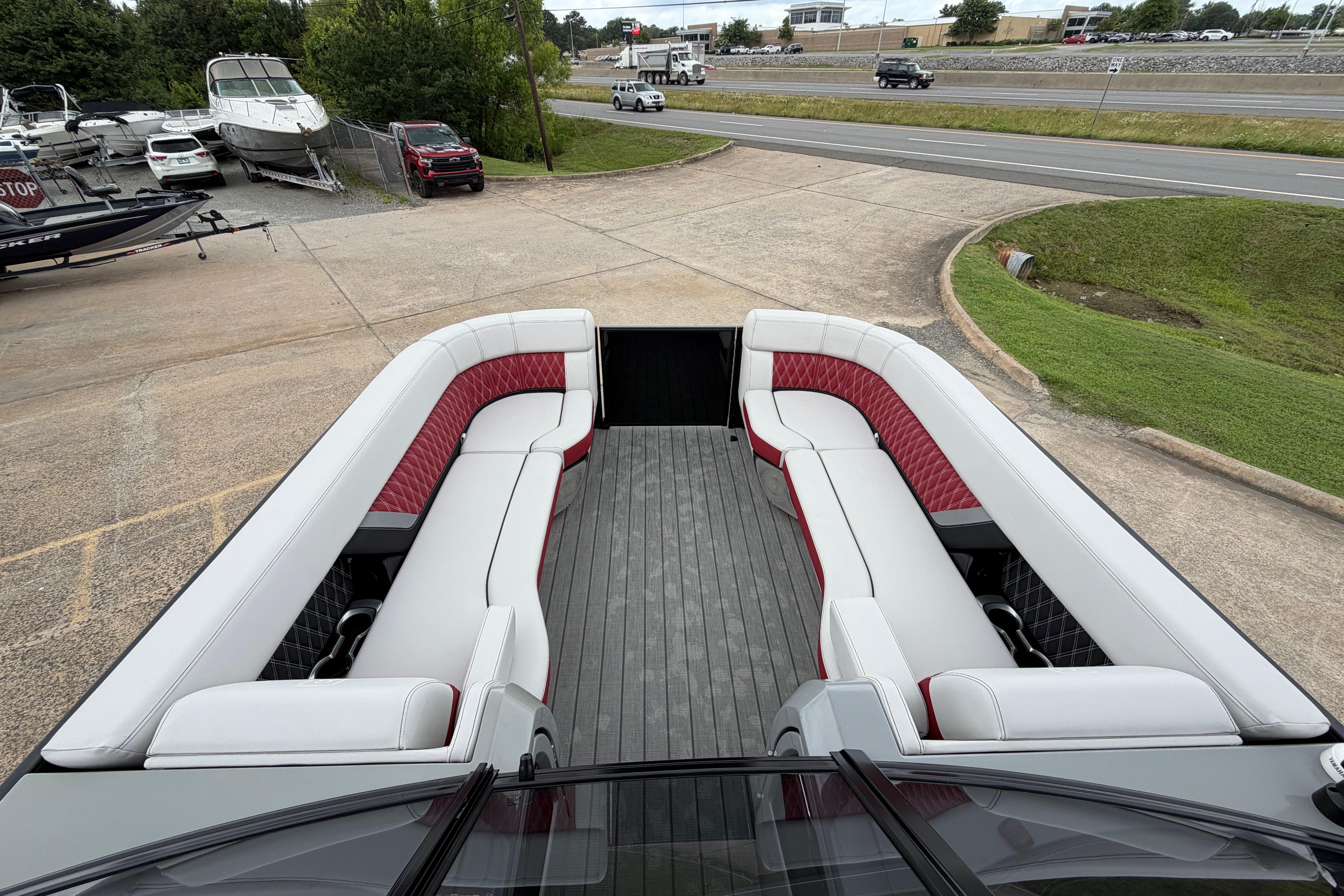 2023 Godfrey Sanpan 2700 ULW Twin pontoon boat with spacious seating and modern design.