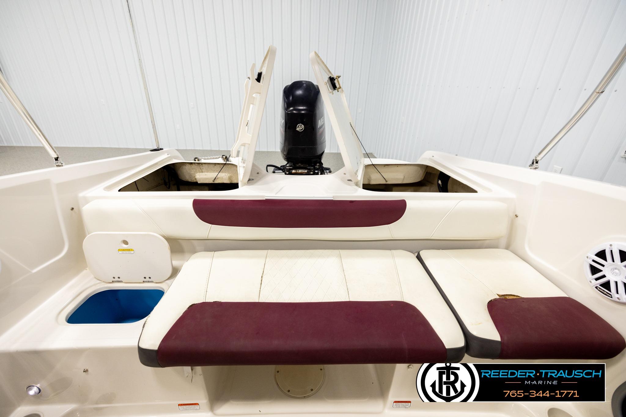 2016 Tahoe 450 TS boat interior with seating and storage compartments.