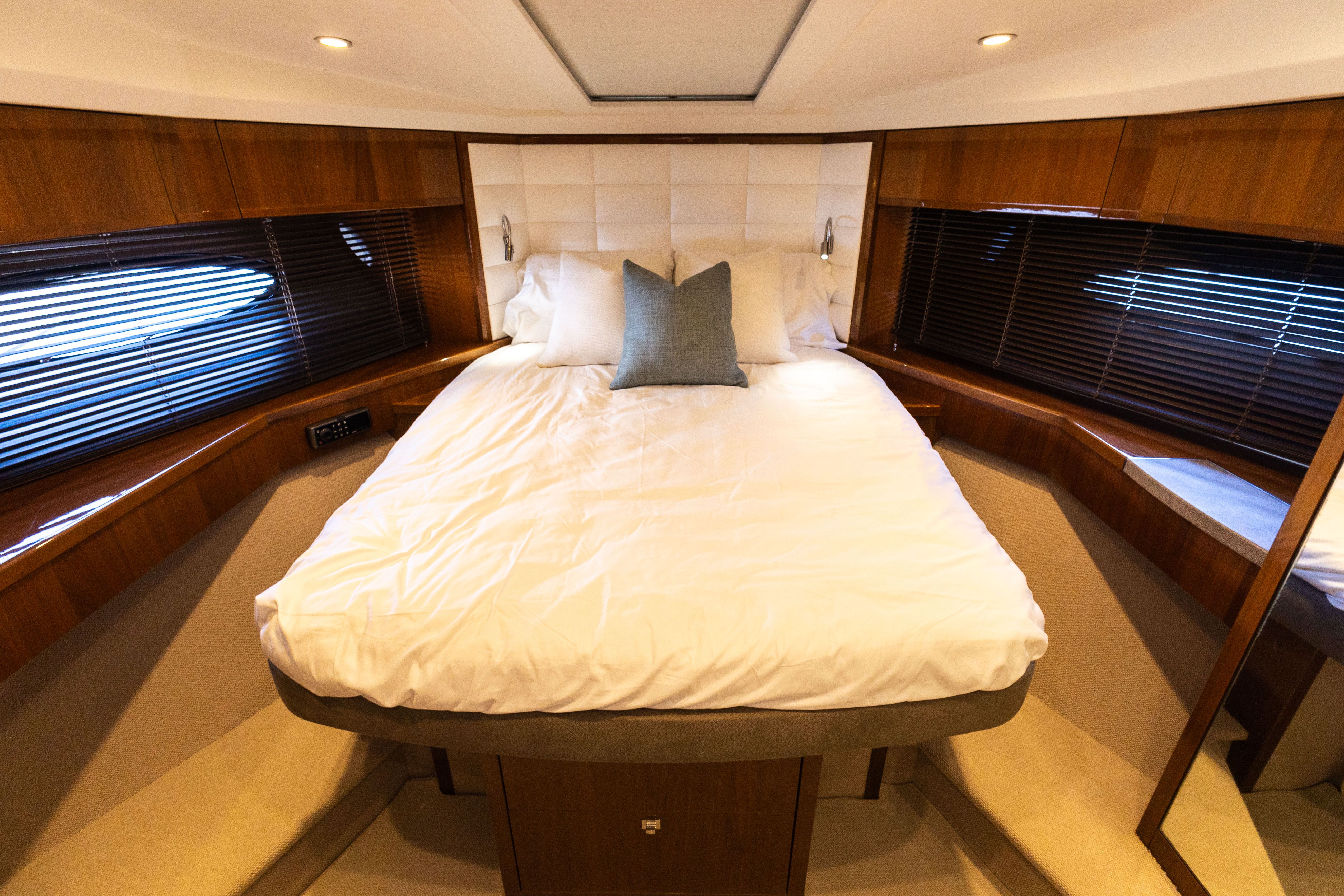 Luxurious bedroom on the 2014 Princess 64 Flybridge Yacht.