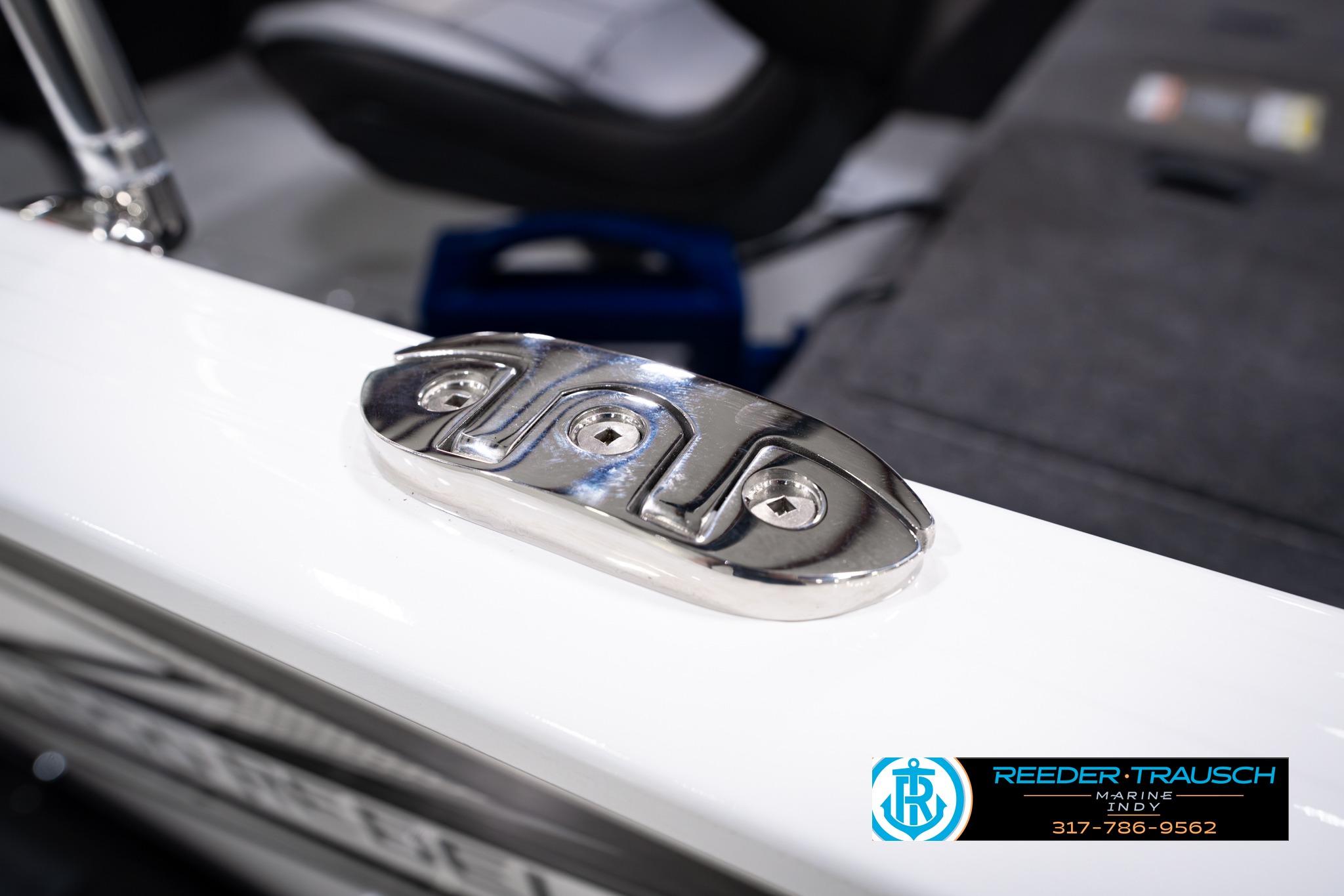 Chrome cleat on 2026 Lund 1650 Rebel XL SS boat, Reeder-Trausch Marine logo visible.