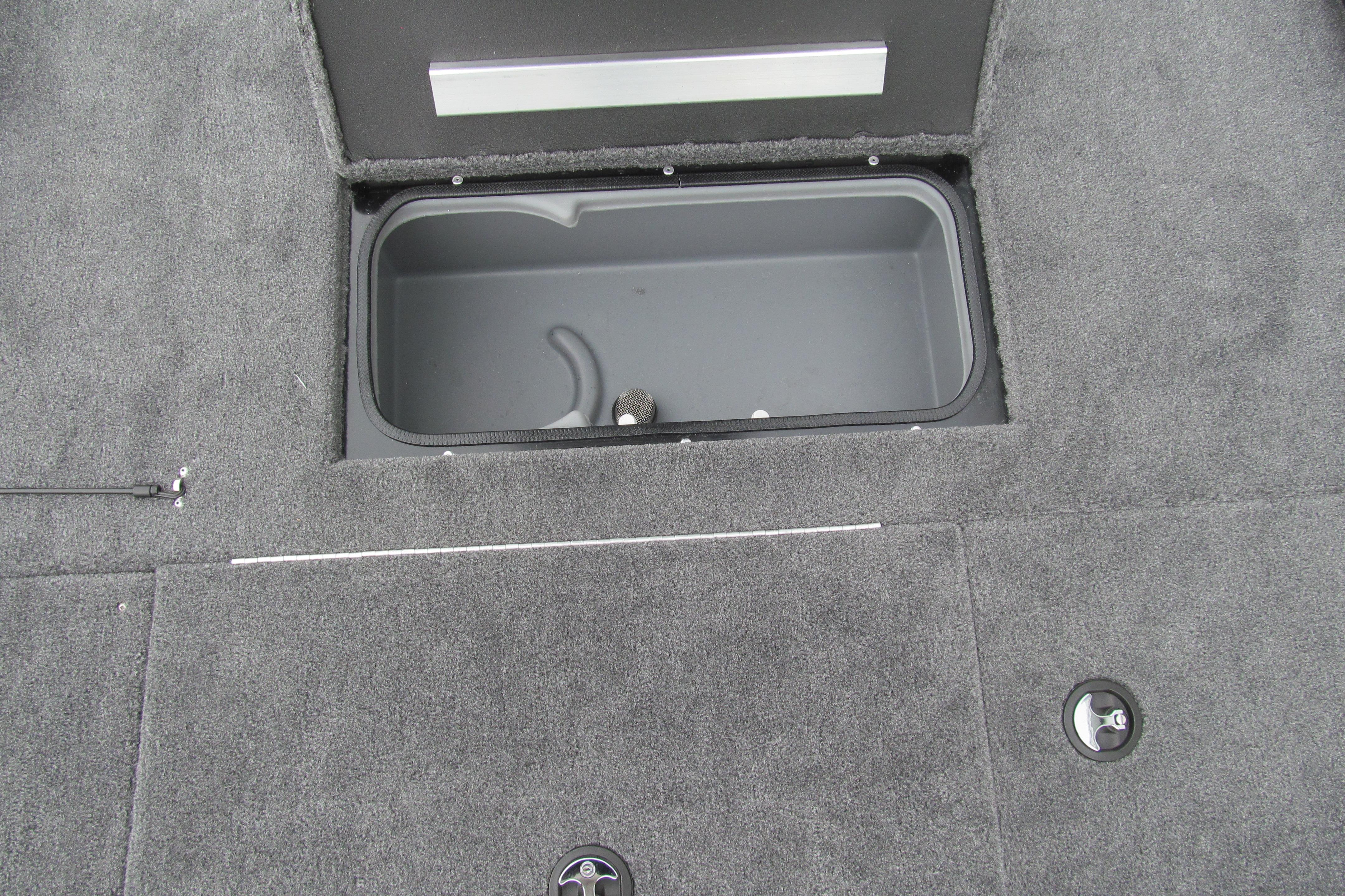 2026 Ranger RT188C boat storage compartment with gray carpeted flooring.