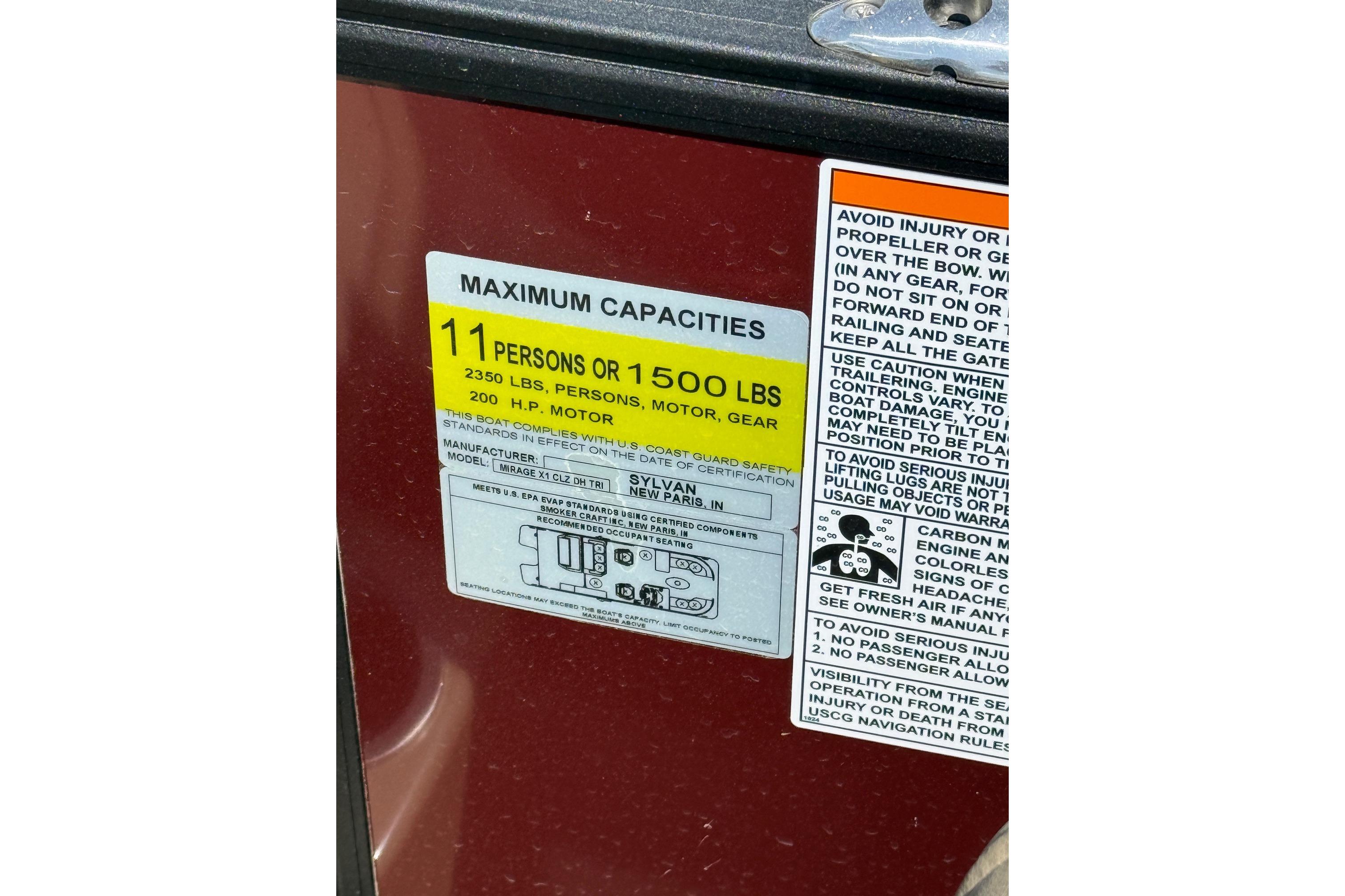 Maximum capacity label on 2024 Sylvan X1 CLZ DH boat, 11 persons or 1500 lbs.