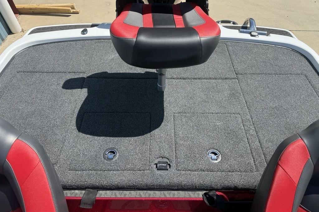2026 Nitro Z20 XL Pro boat deck with red and black seating, featuring storage compartments.