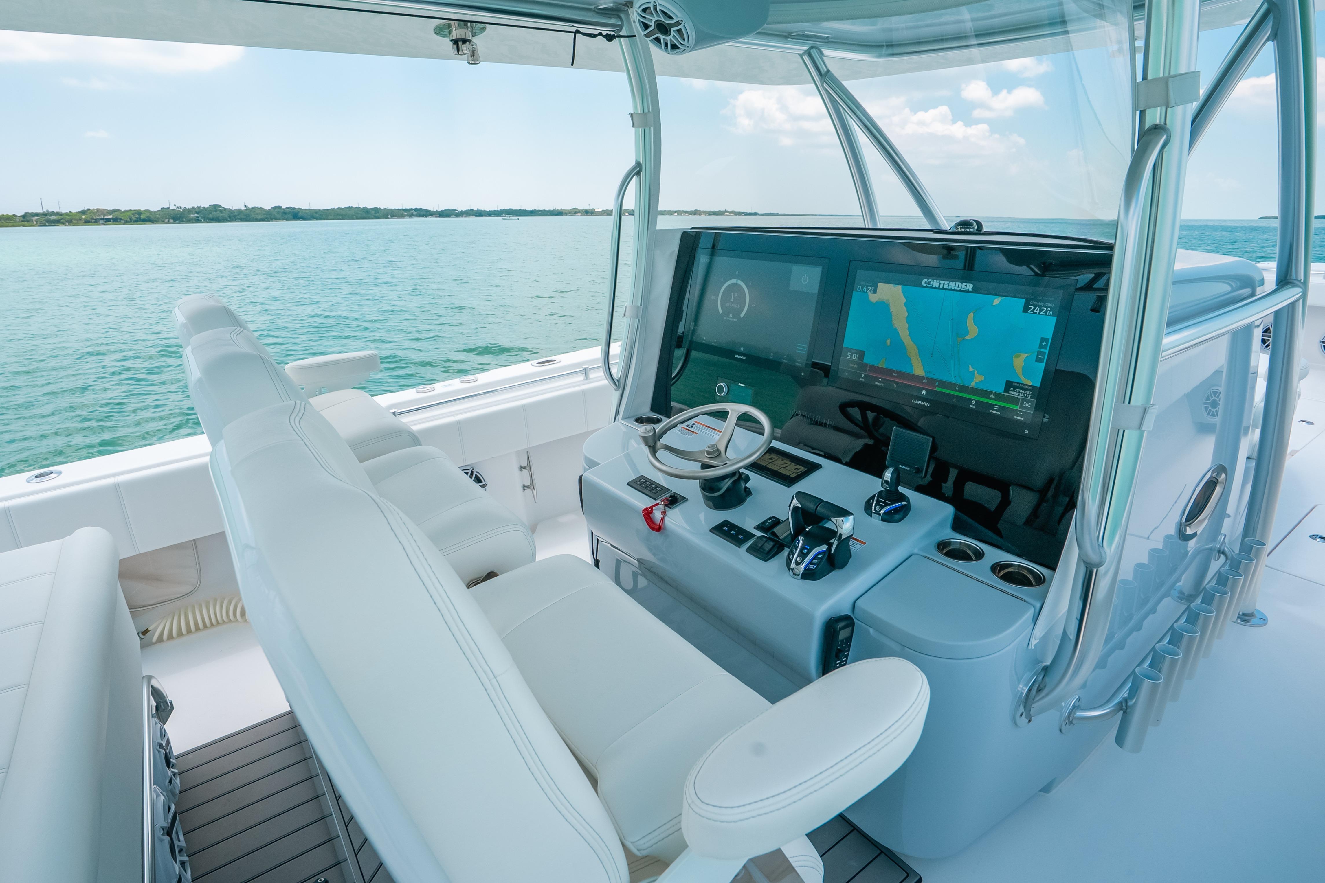 2025 Contender 44 ST boat cockpit with advanced navigation system and luxurious seating.