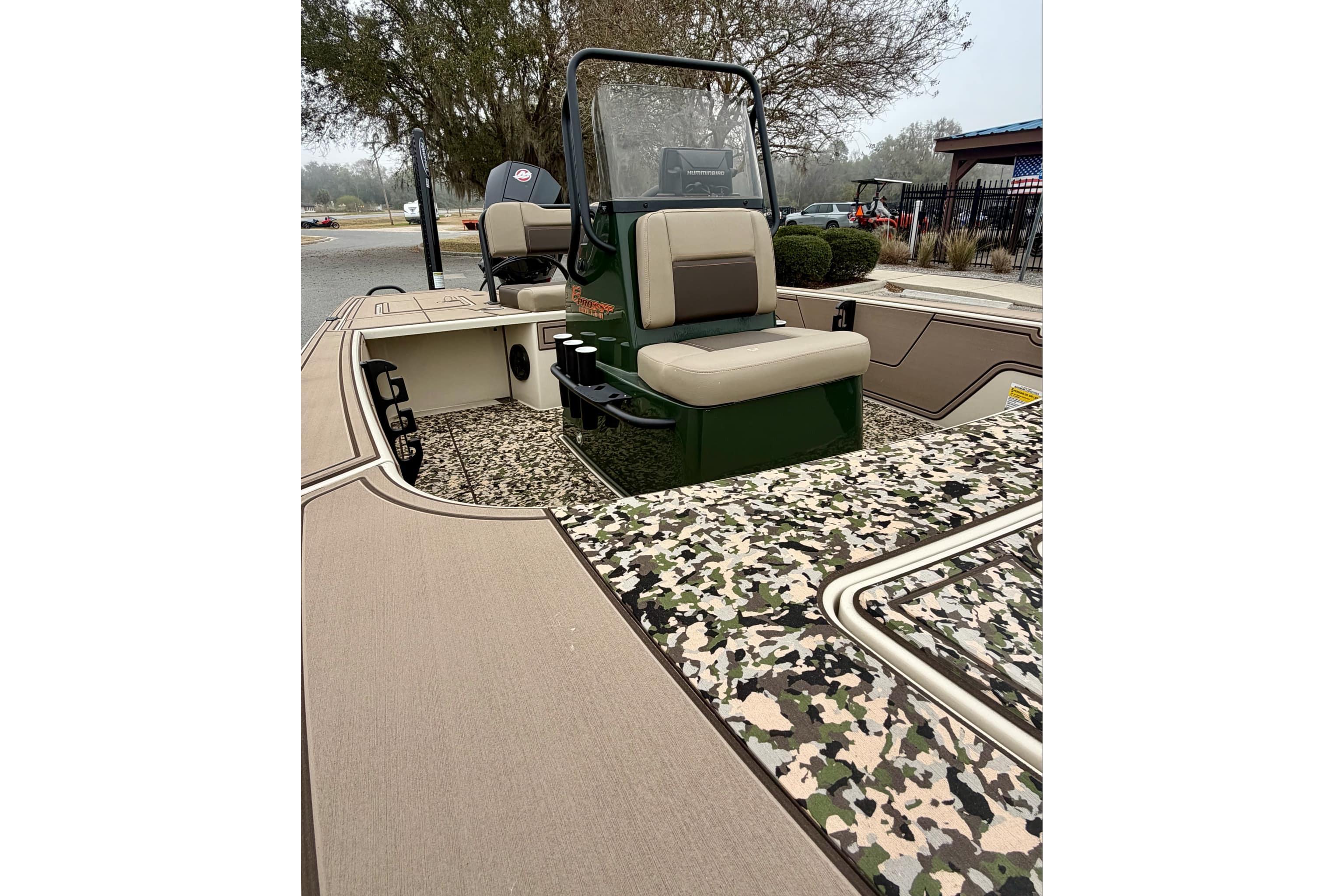 2025 Mako 18 Pro Skiff Backwater Edition with camouflage deck and seating.