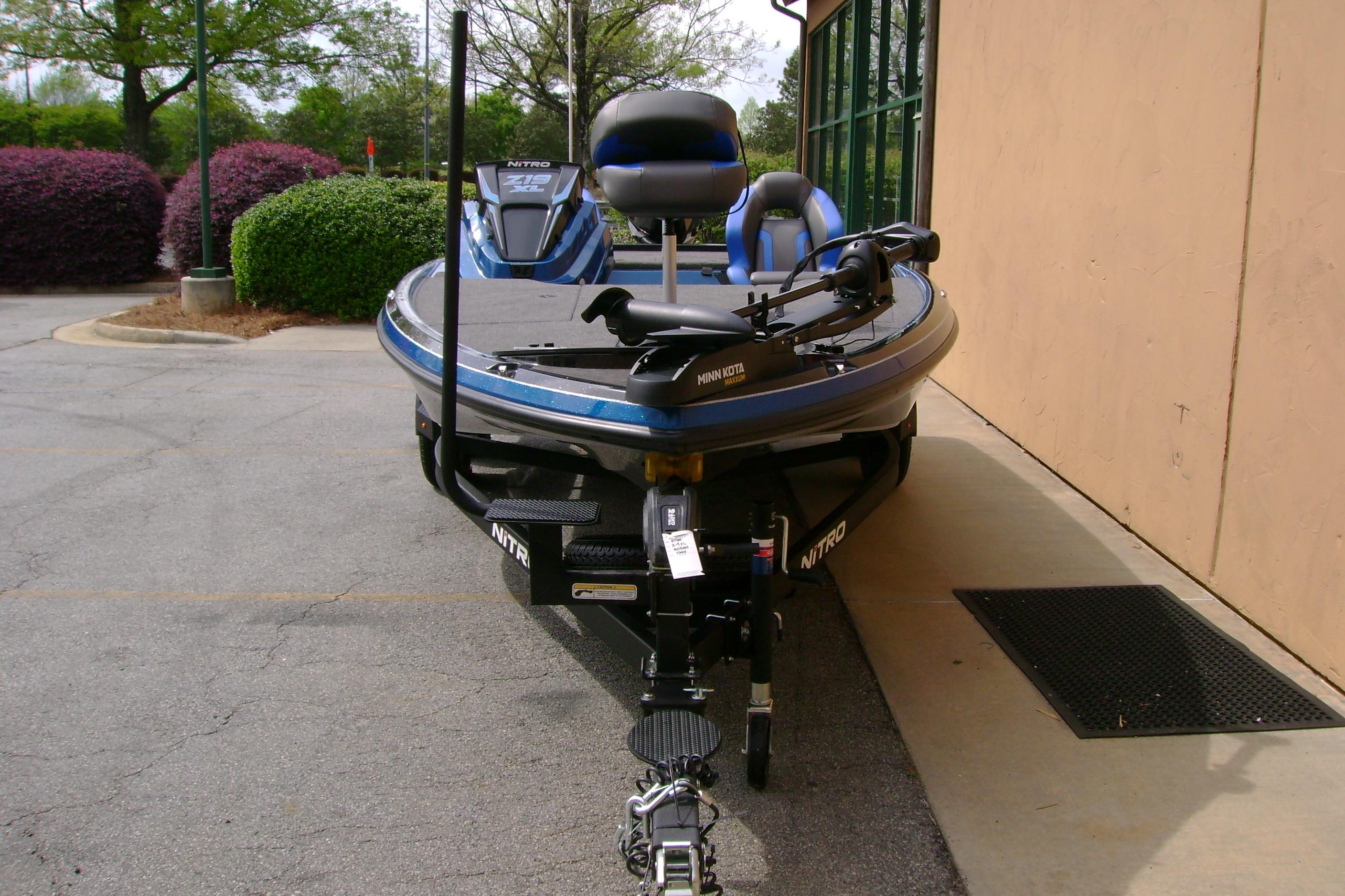 2026 Nitro Z19 XL boat parked outdoors, featuring sleek design and modern equipment.