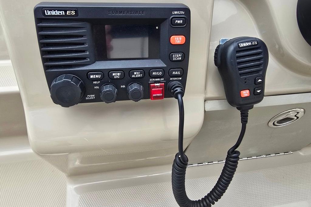 Uniden ES radio system on 2006 Sea Ray 240 Sundancer boat dashboard.