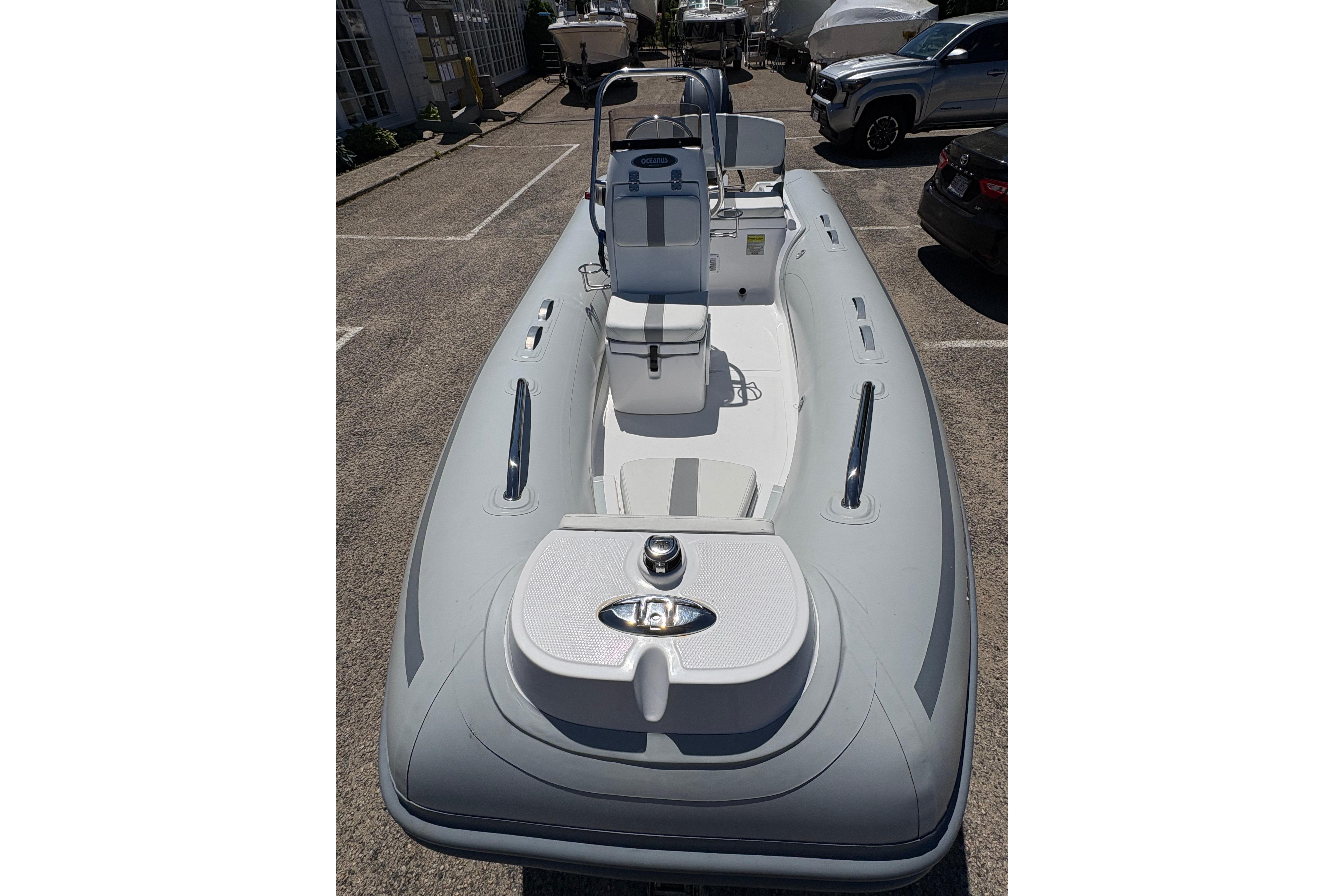 2022 AB Inflatables Oceanus 14 VST boat in a parking lot, showcasing sleek design.