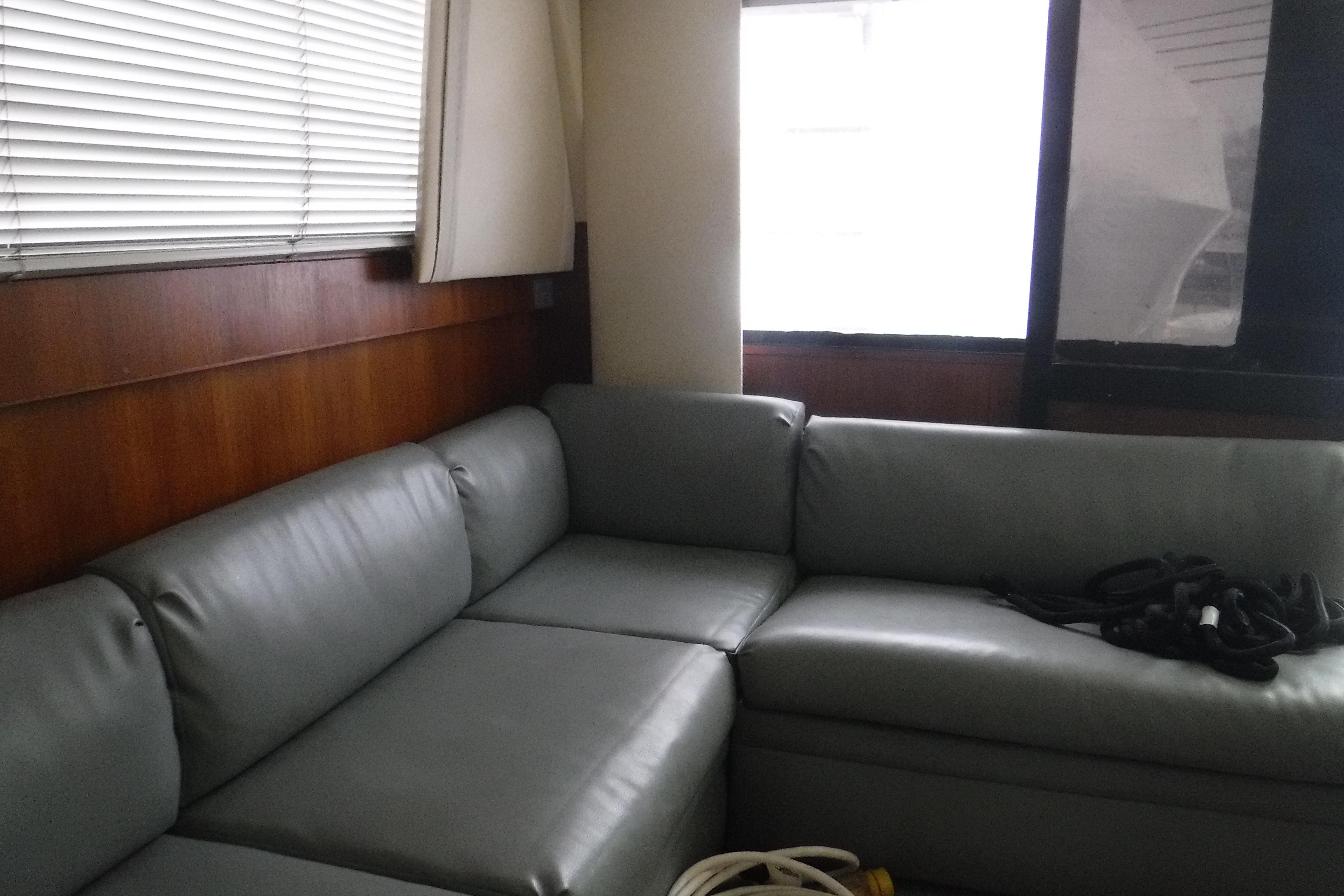 Interior of 1989 Viking 41 Sportfish Convertible with gray leather seating.