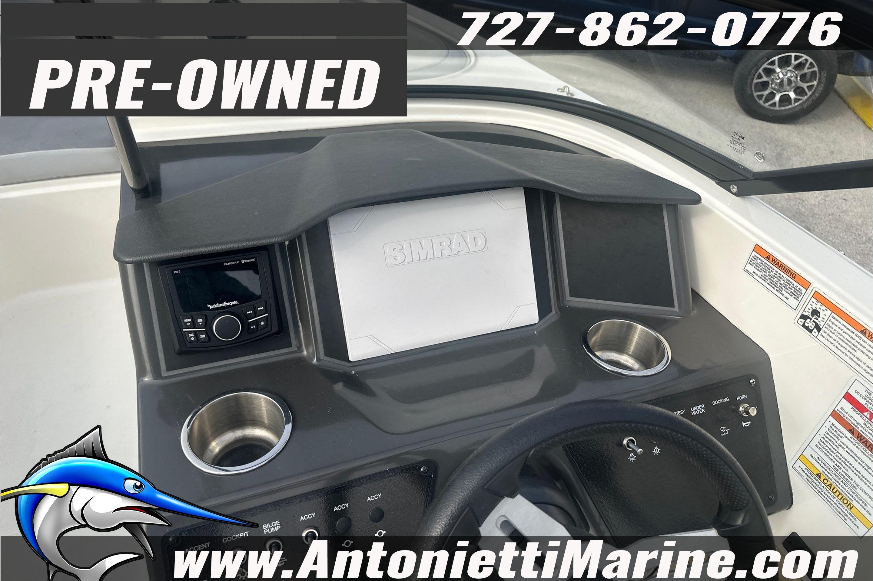 Pre-owned 2022 Bayliner VR6 Bowrider OB dashboard with Simrad display and controls.