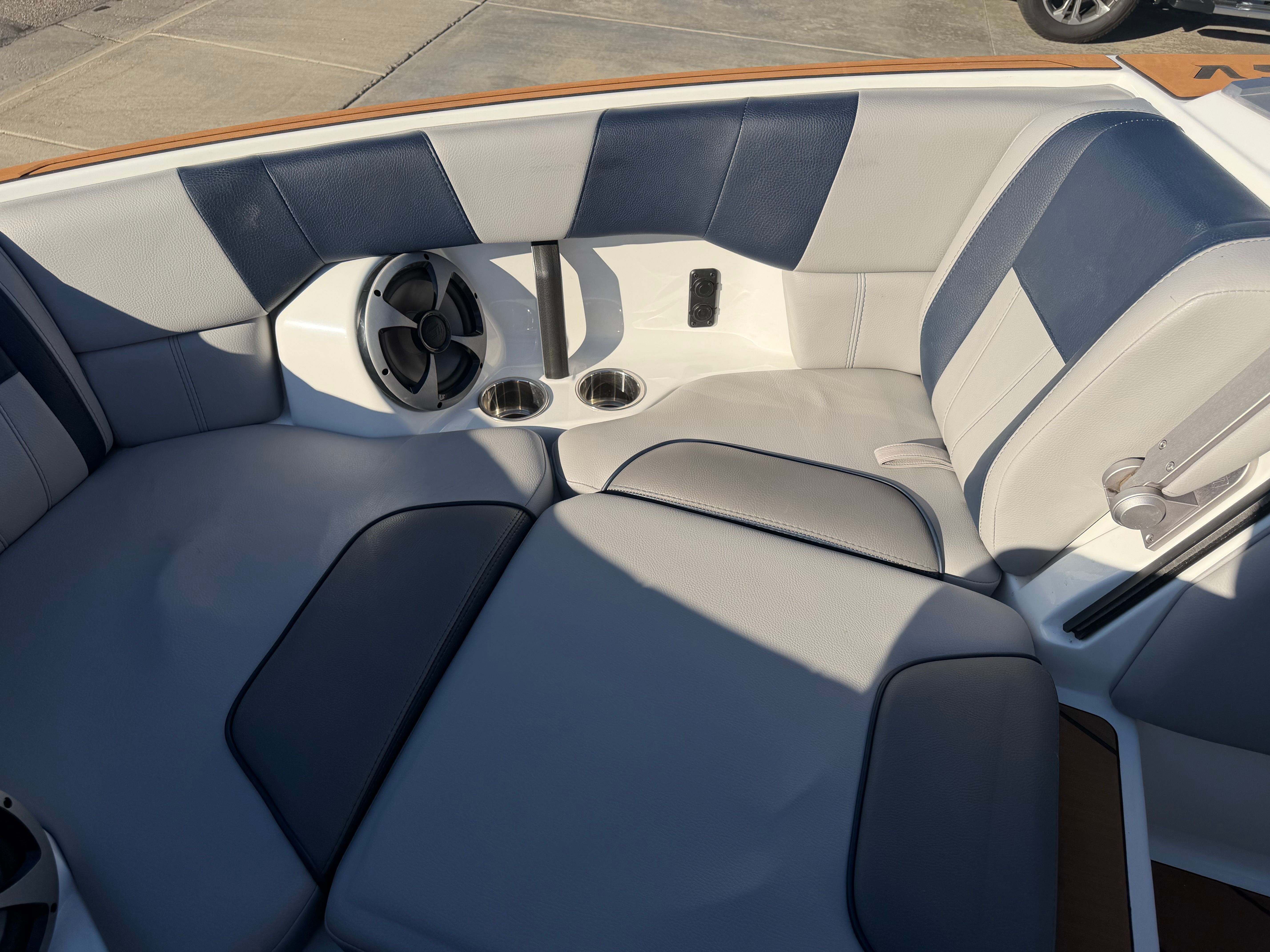 Interior view of a 2021 Malibu Wakesetter 23 LSV with gray and blue upholstery.