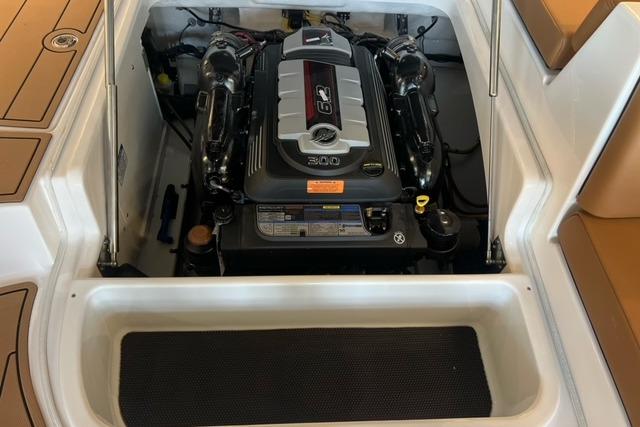 Engine compartment of 2025 Chaparral 247 SSX boat, showcasing powerful 6.2L engine.