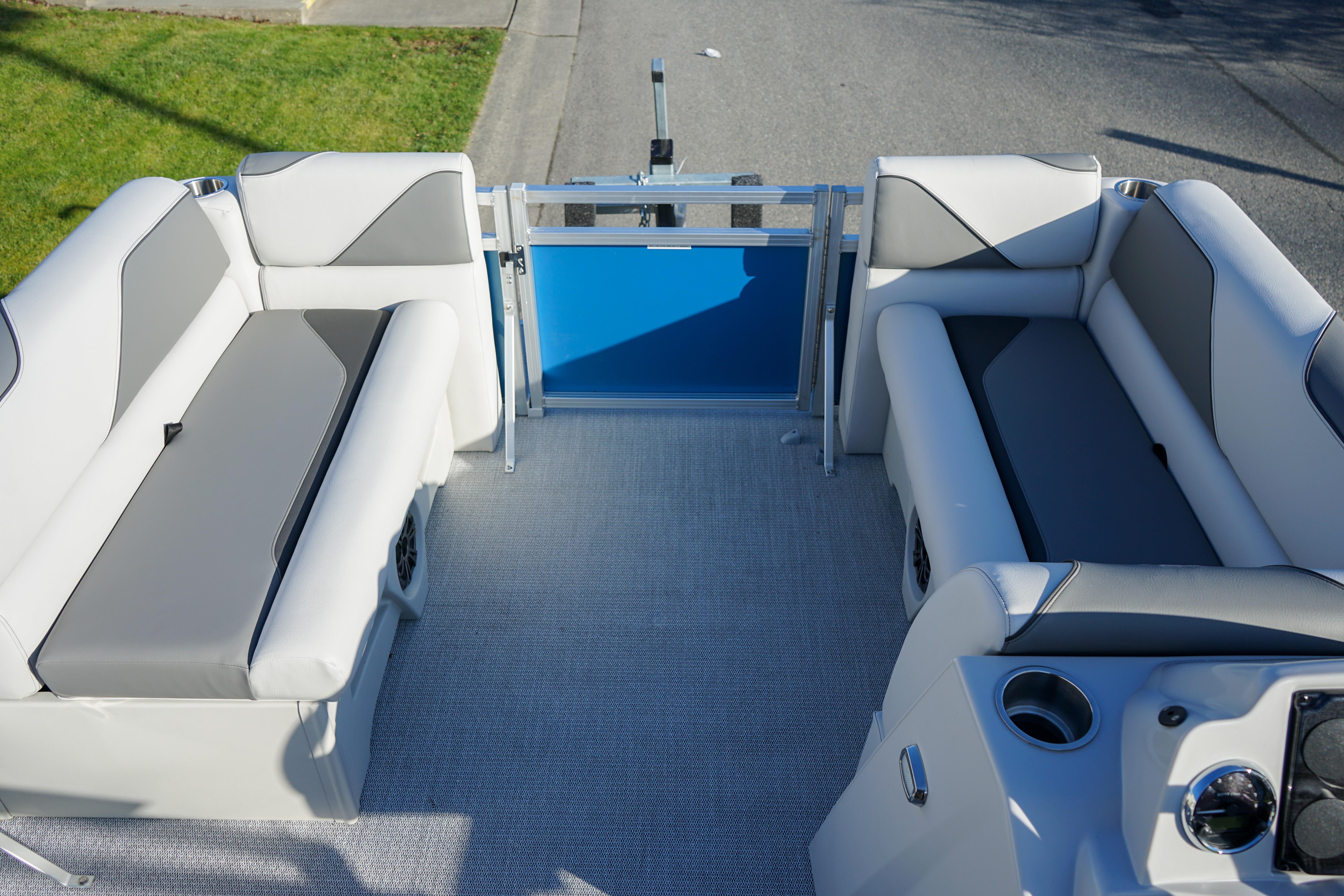 2024 Avalon 17 Venture Cruise interior with gray seating and blue gate.