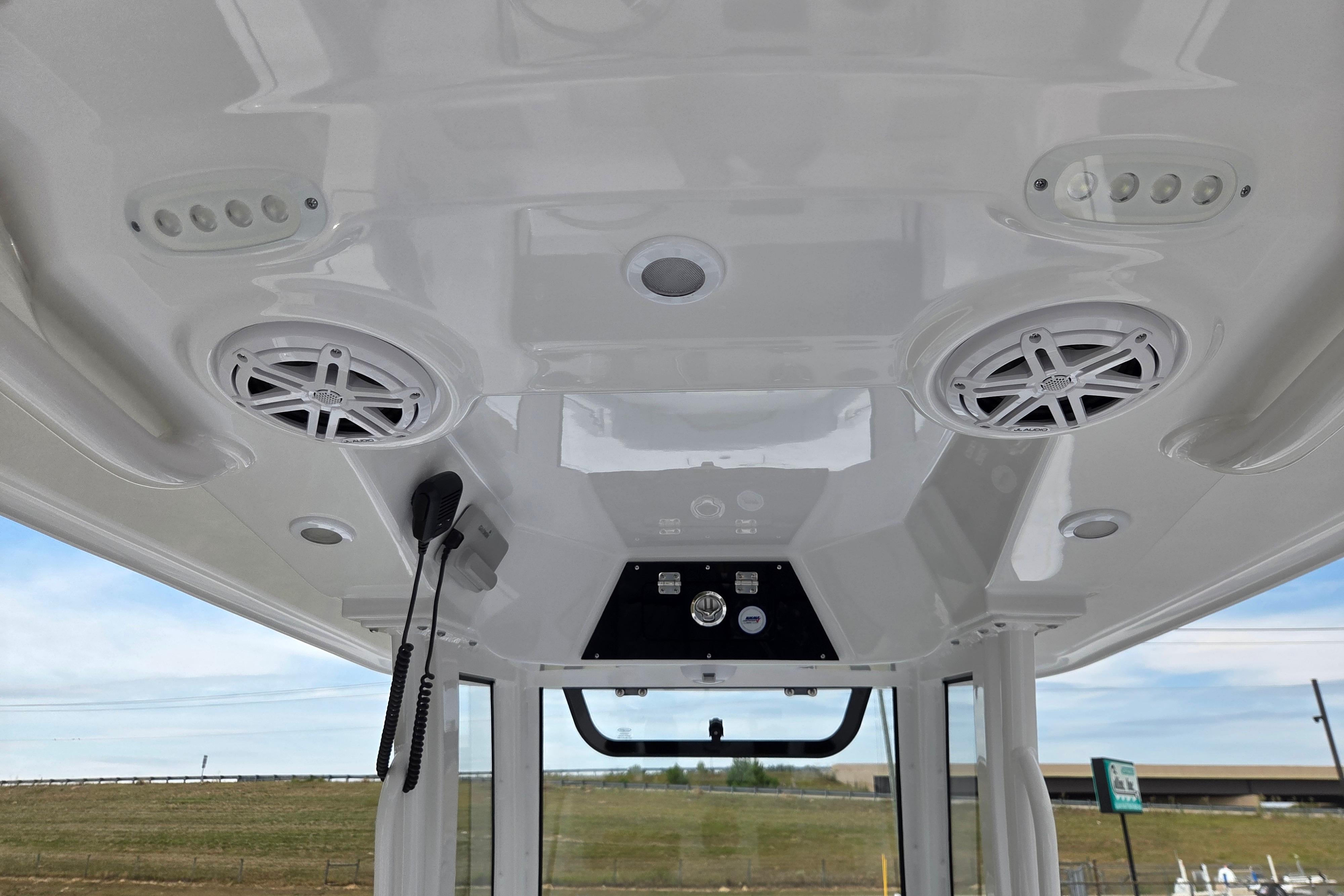 2026 Sportsman Masters 247OE Bay Boat interior ceiling with speakers and controls.