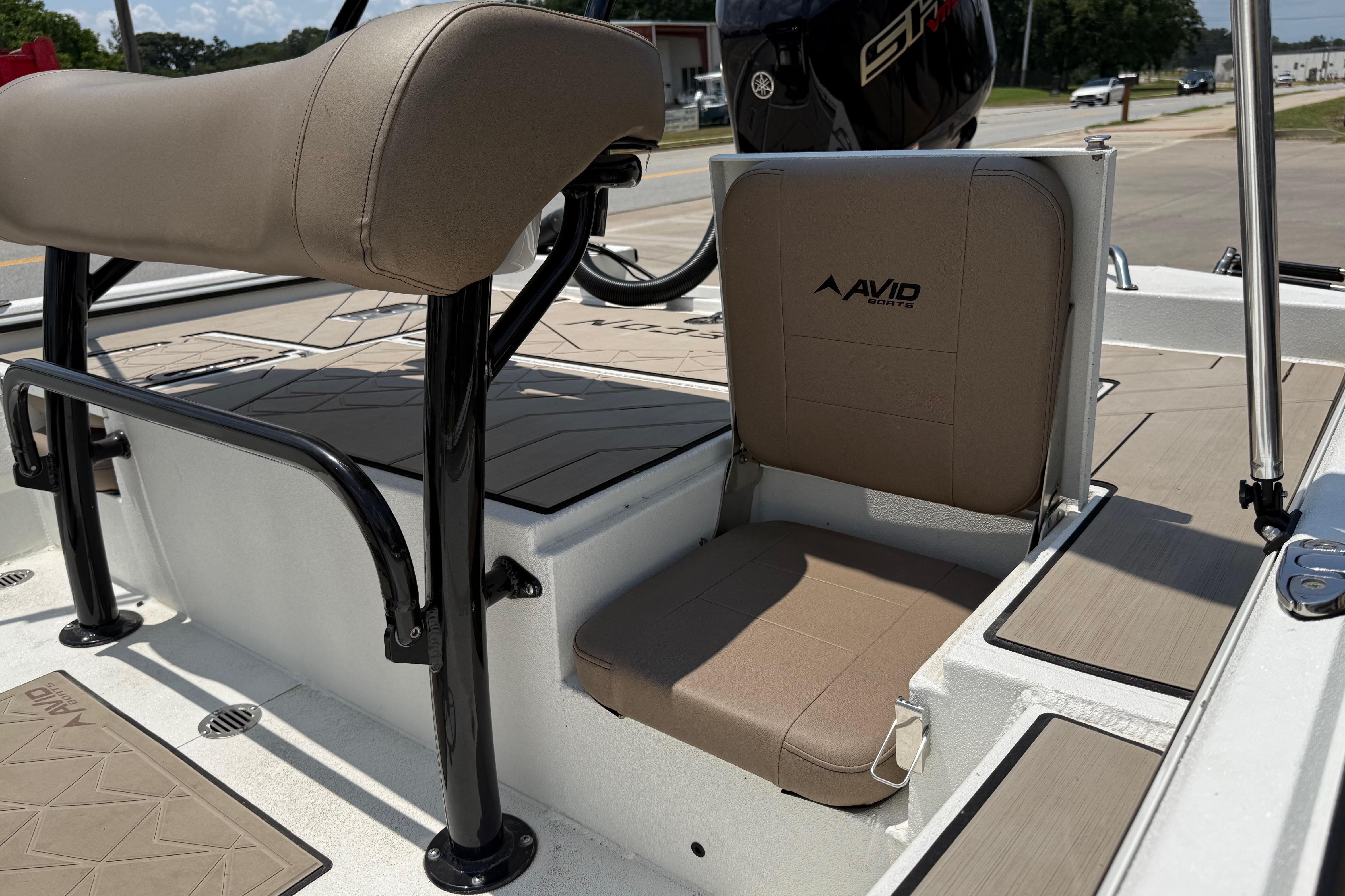 2025 Avid 22 Recon boat interior with tan seating and sleek design.