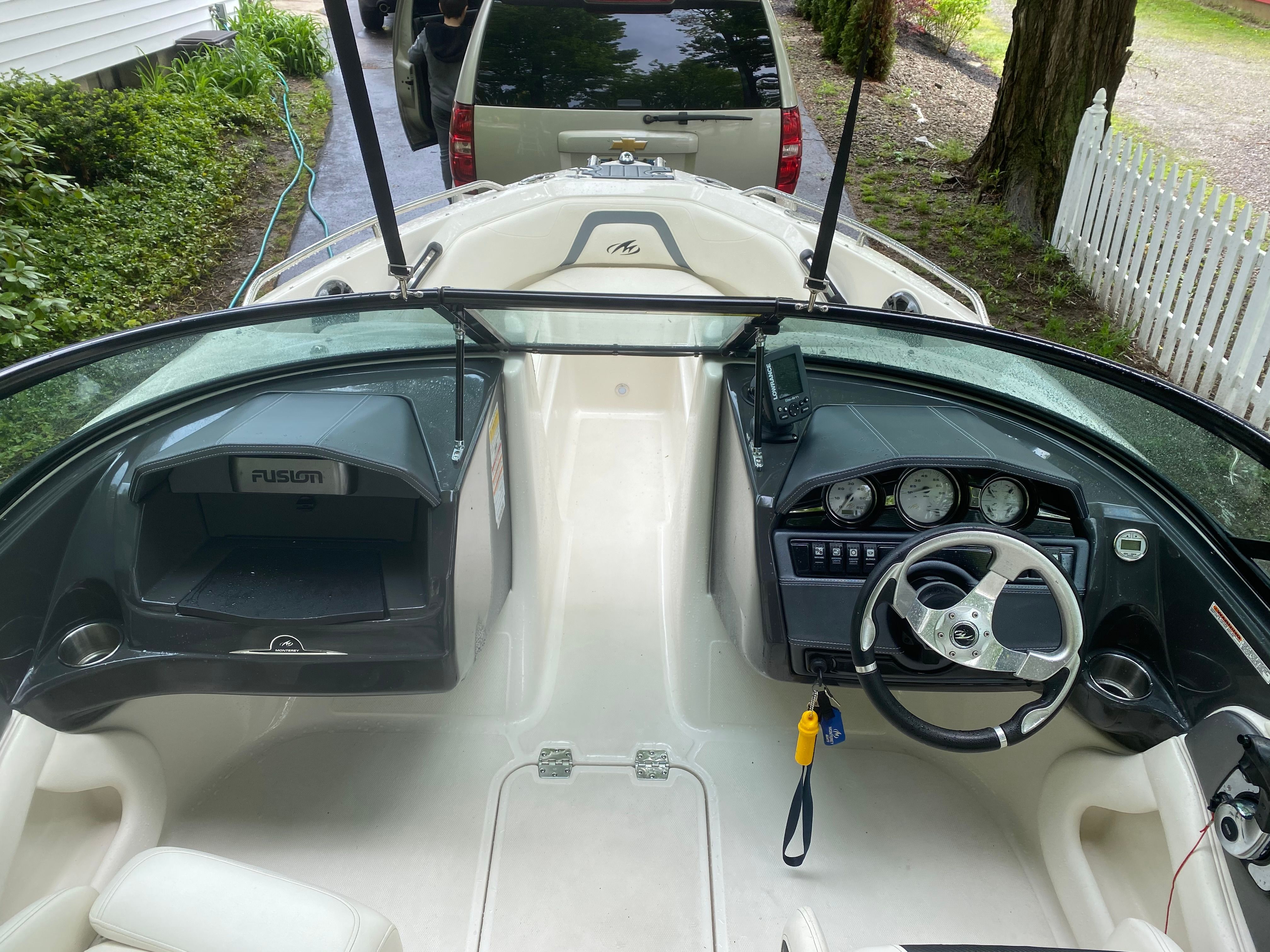 Interior view of a 2013 Monterey 204FSX boat with dashboard.