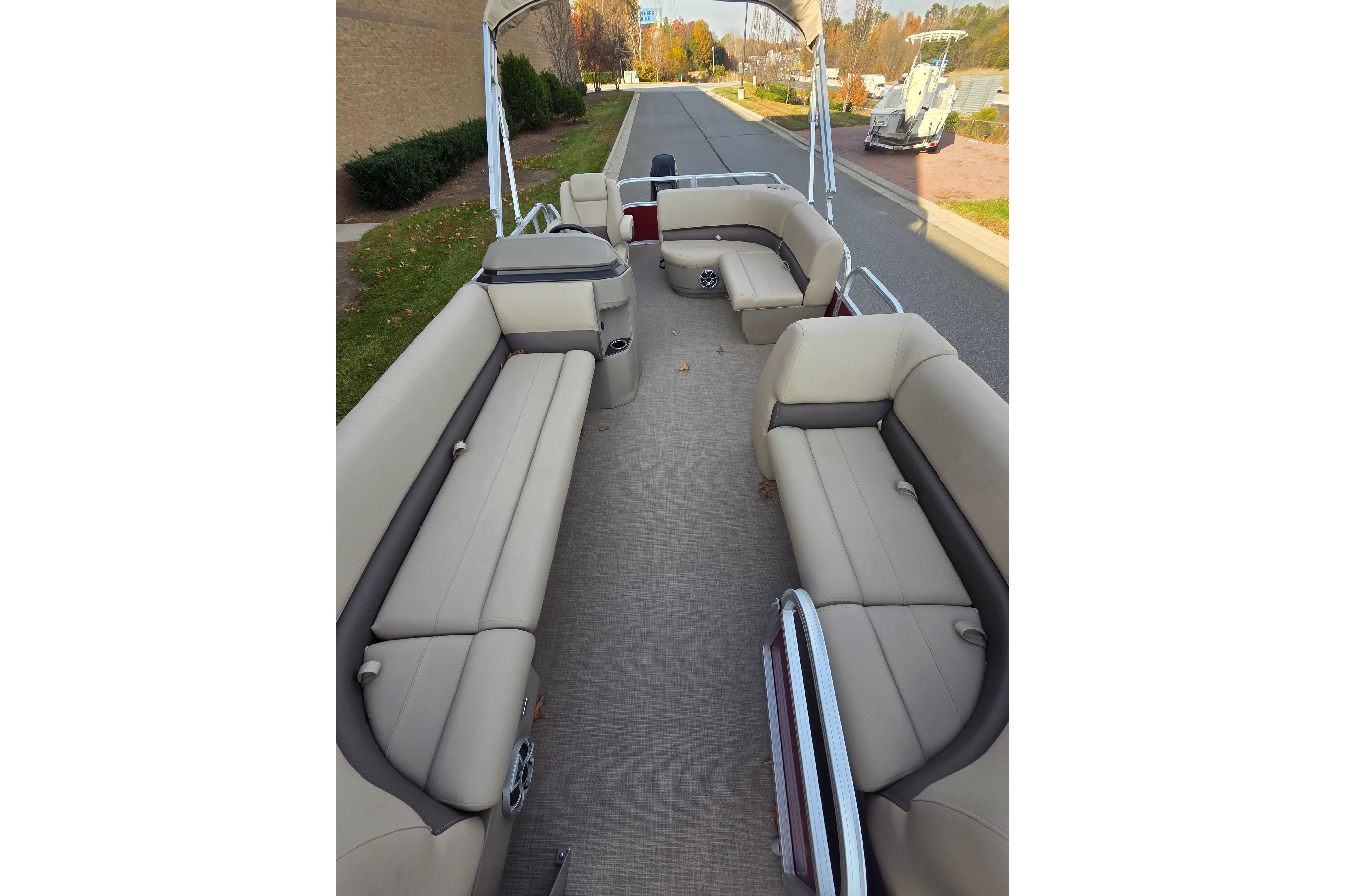 2025 Sun Tracker Party Barge 18 DLX interior with spacious seating and modern design.