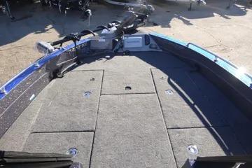 2026 Ranger 621FS Cup Equipped boat deck with carpeted surface and storage compartments.