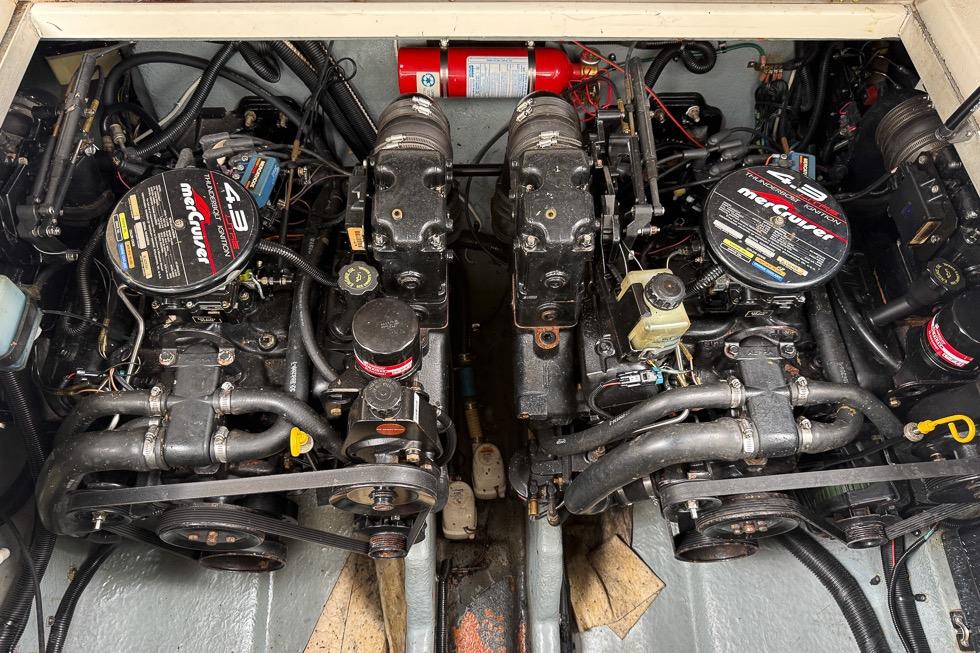 Engine compartment of a 1999 Sea Ray 290 Sundancer with twin MerCruiser engines.