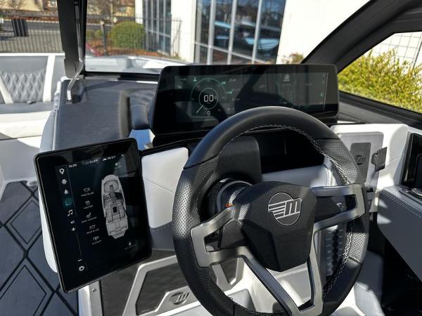 2025 Malibu M230 dashboard with digital displays and modern steering wheel.