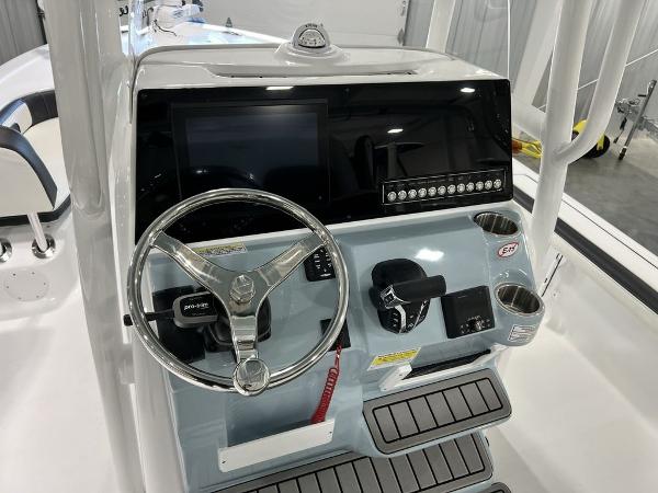 2025 Tidewater 2300 Carolina Bay boat console with steering wheel and controls.