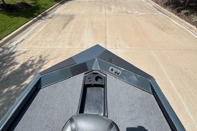 2026 Ranger RT188 boat deck on a concrete surface, showcasing sleek design.