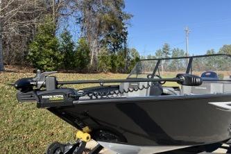 2026 Tracker Pro Guide V-175 Combo boat on trailer, outdoors, clear sky.