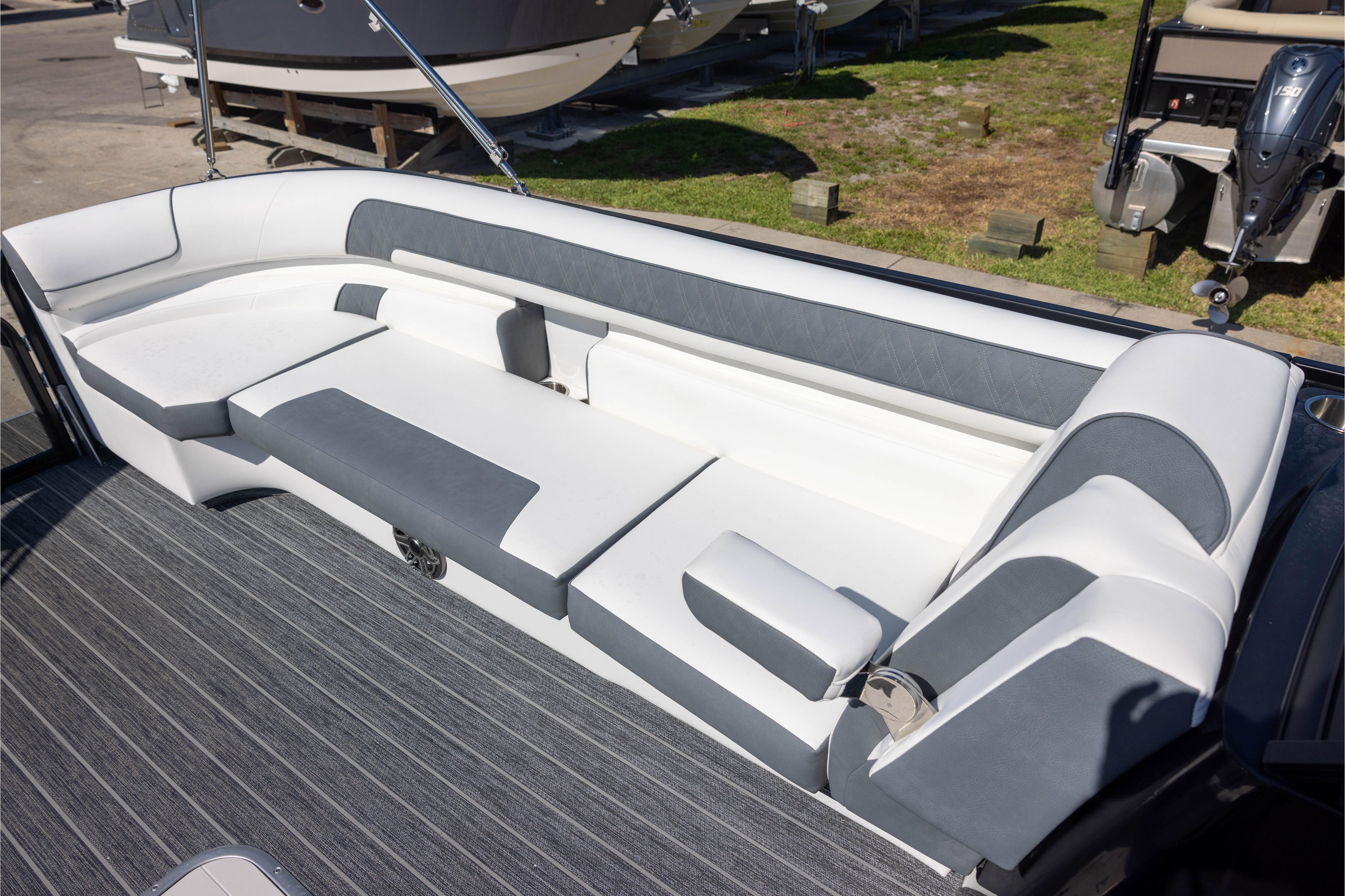 2024 Premier 270 Super Sport boat interior with sleek white and gray seating.