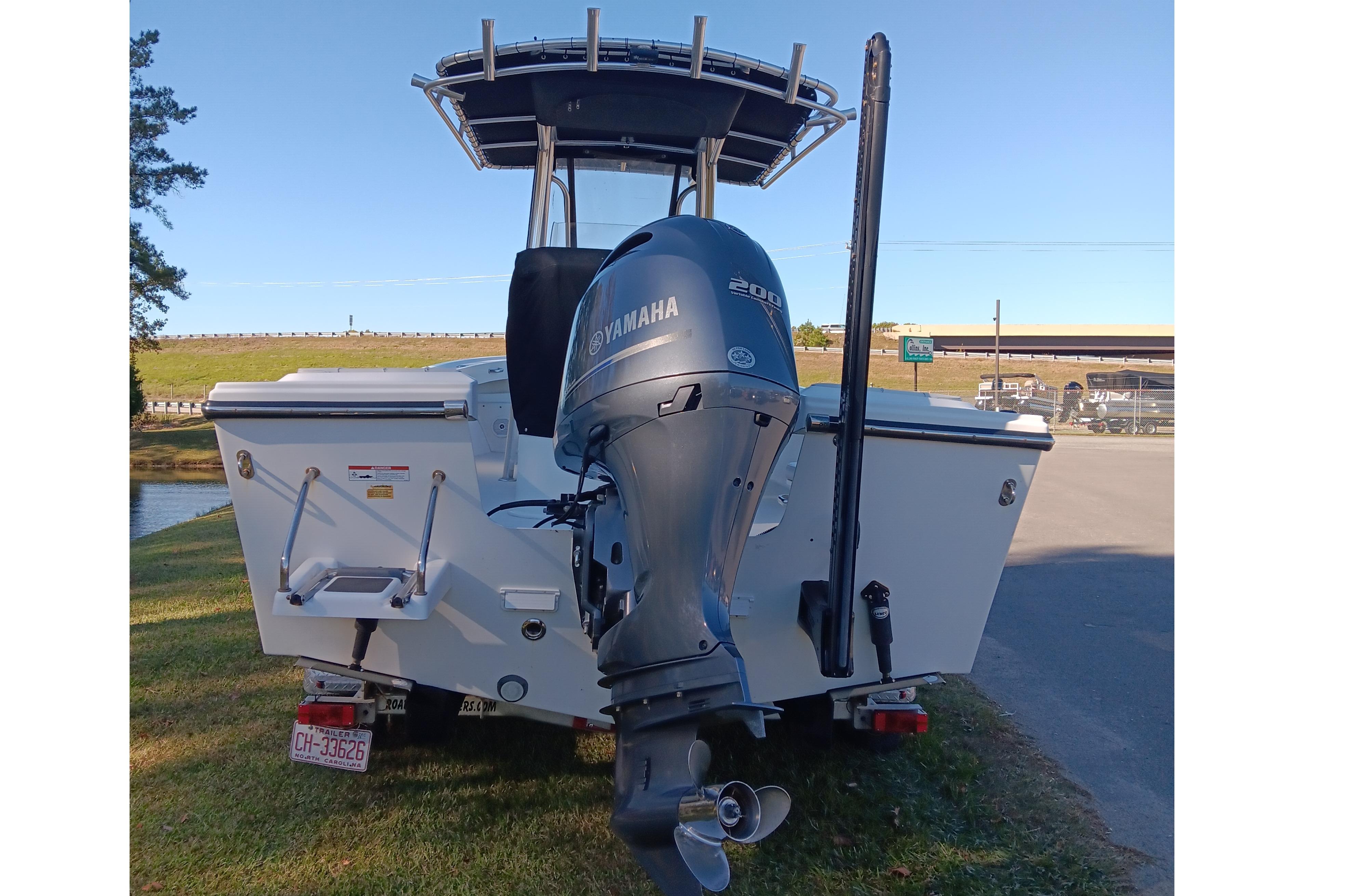 2016 Parker 2300 Special Edition boat with Yamaha 200 engine, rear view.