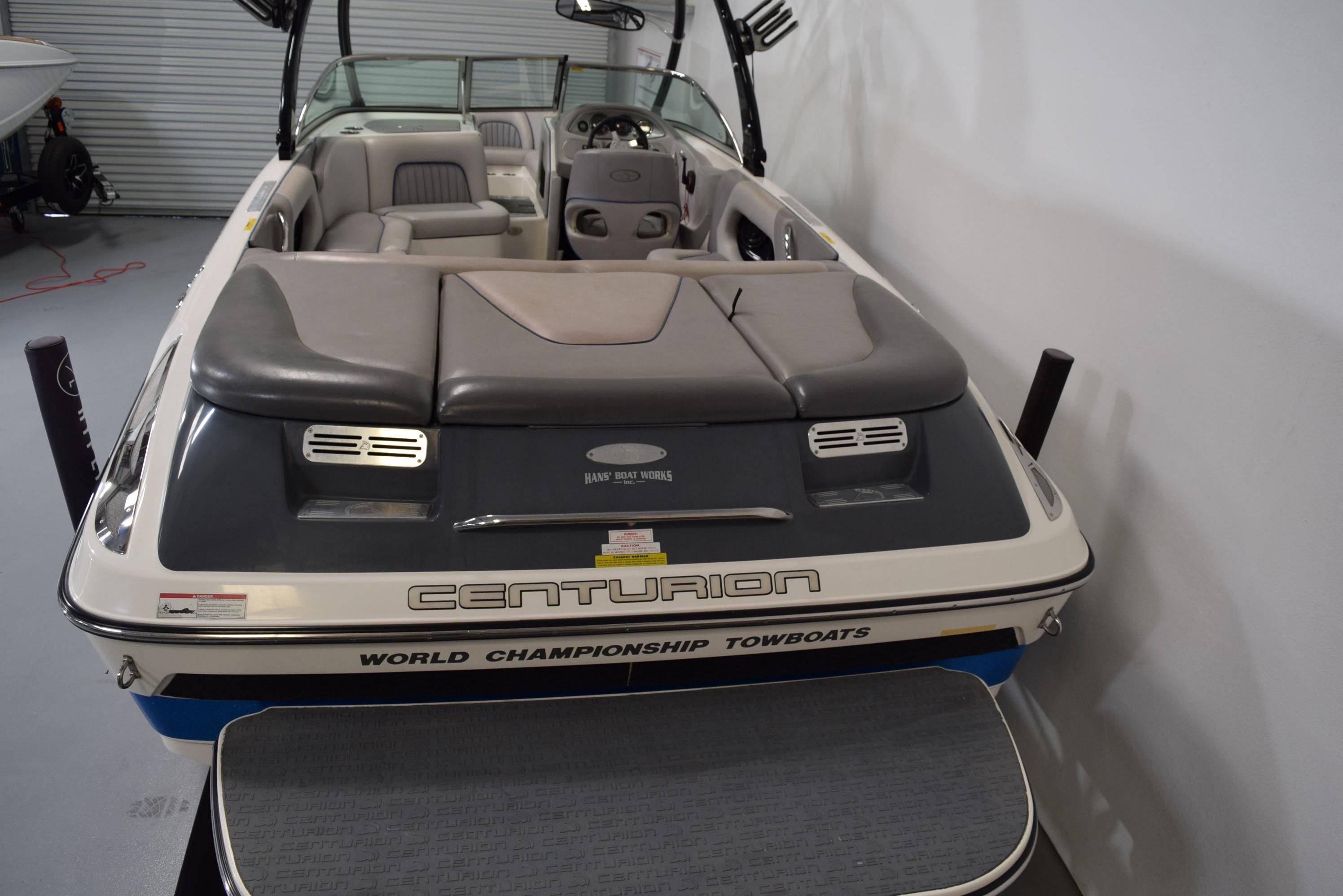 2007 Centurion SV 240 boat, interior view, showcasing seating and dashboard.
