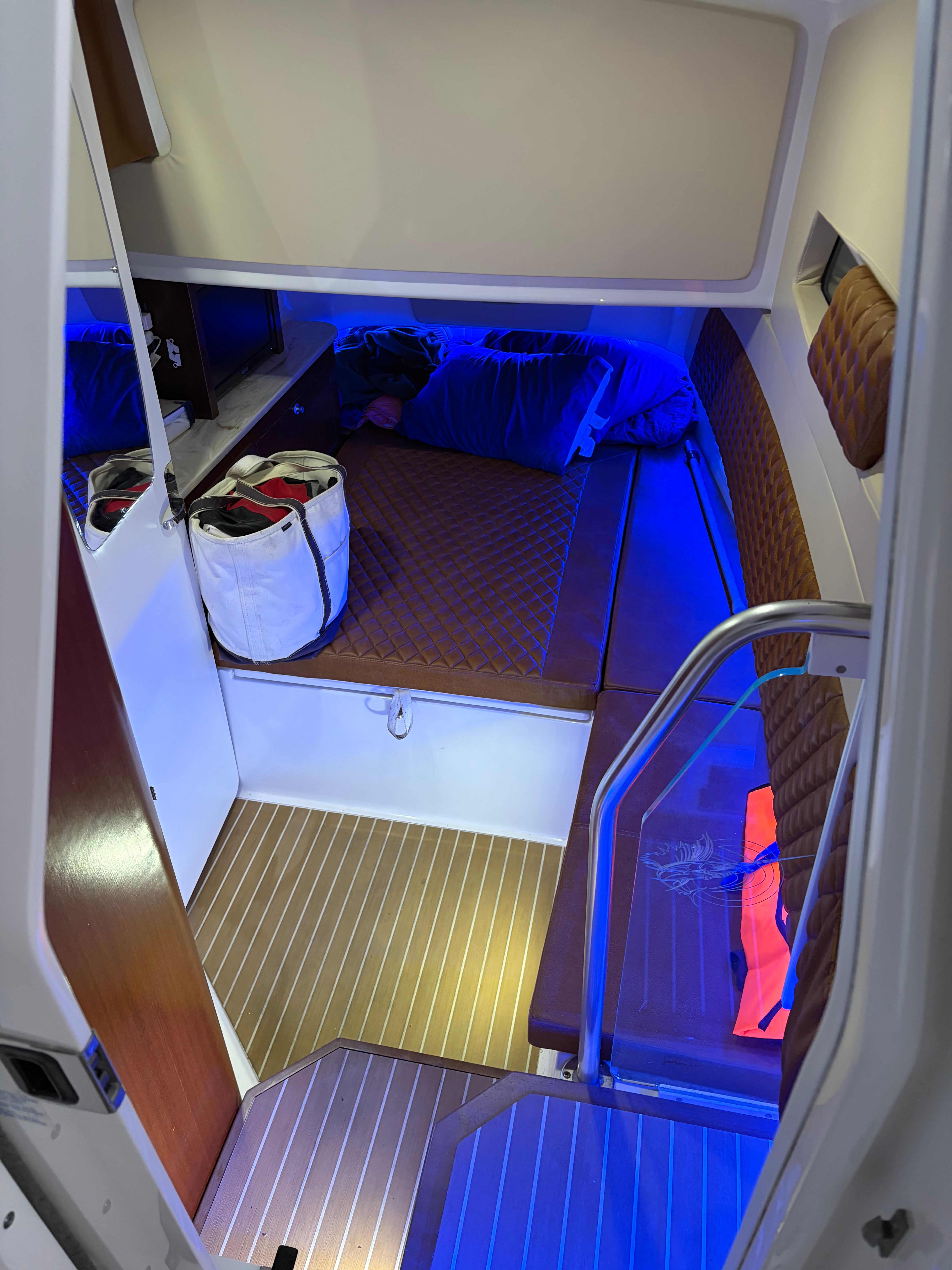 Interior of a 2019 Edgewater 370CC with blue lighting.