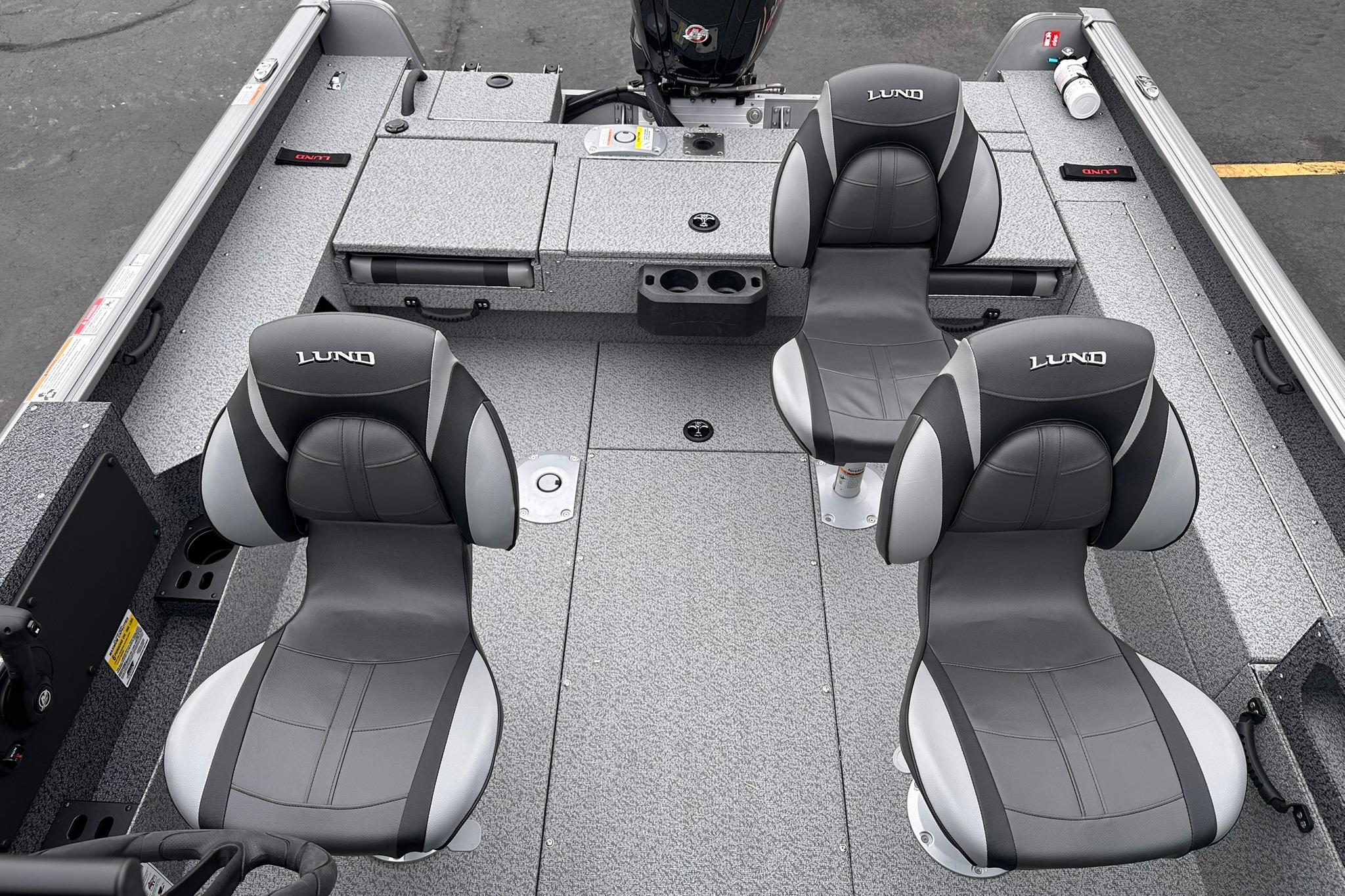 2026 Lund 1775 Impact XS Sport boat interior with four cushioned seats.