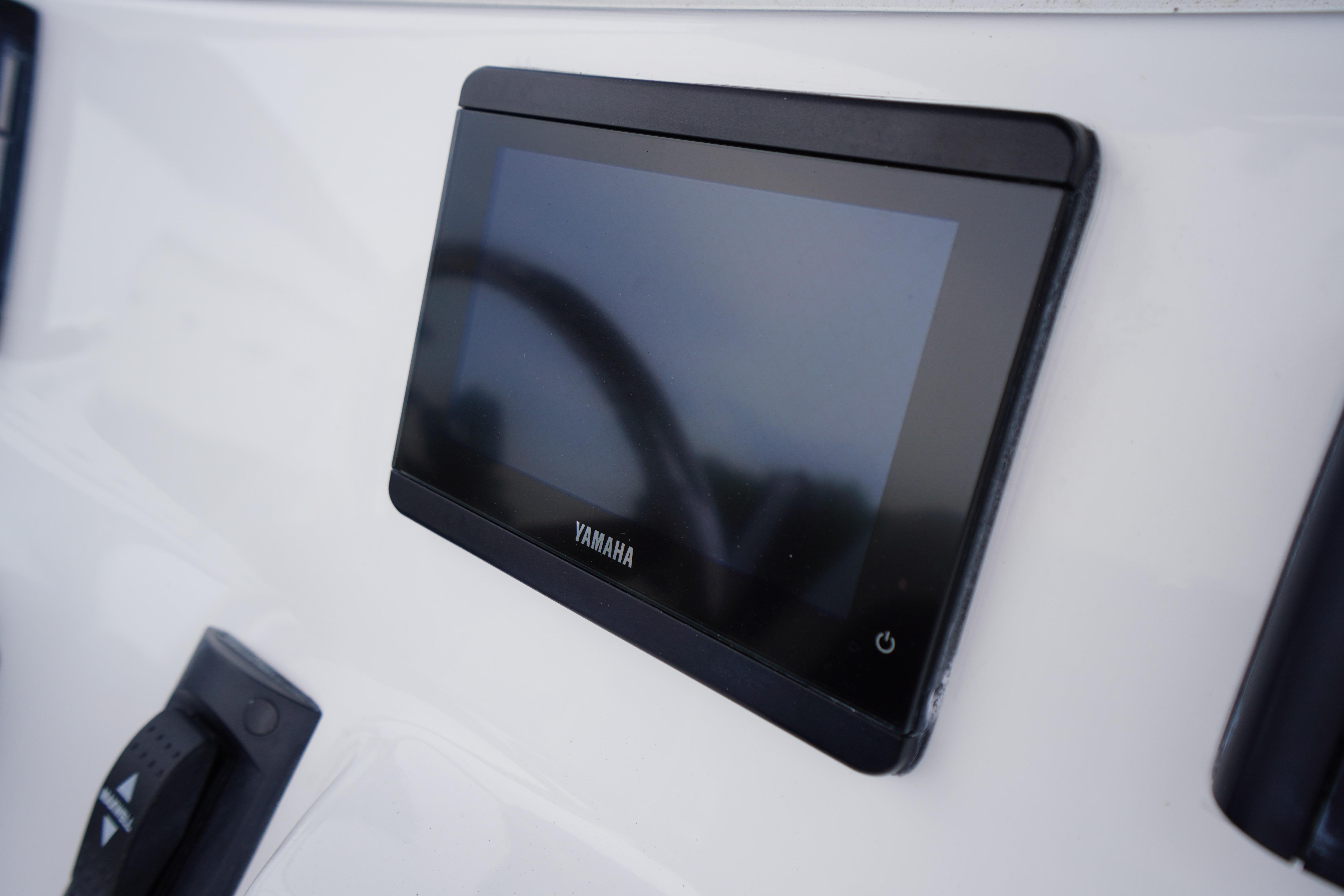 Yamaha display screen on 2026 Tidewater 232 SS boat dashboard.