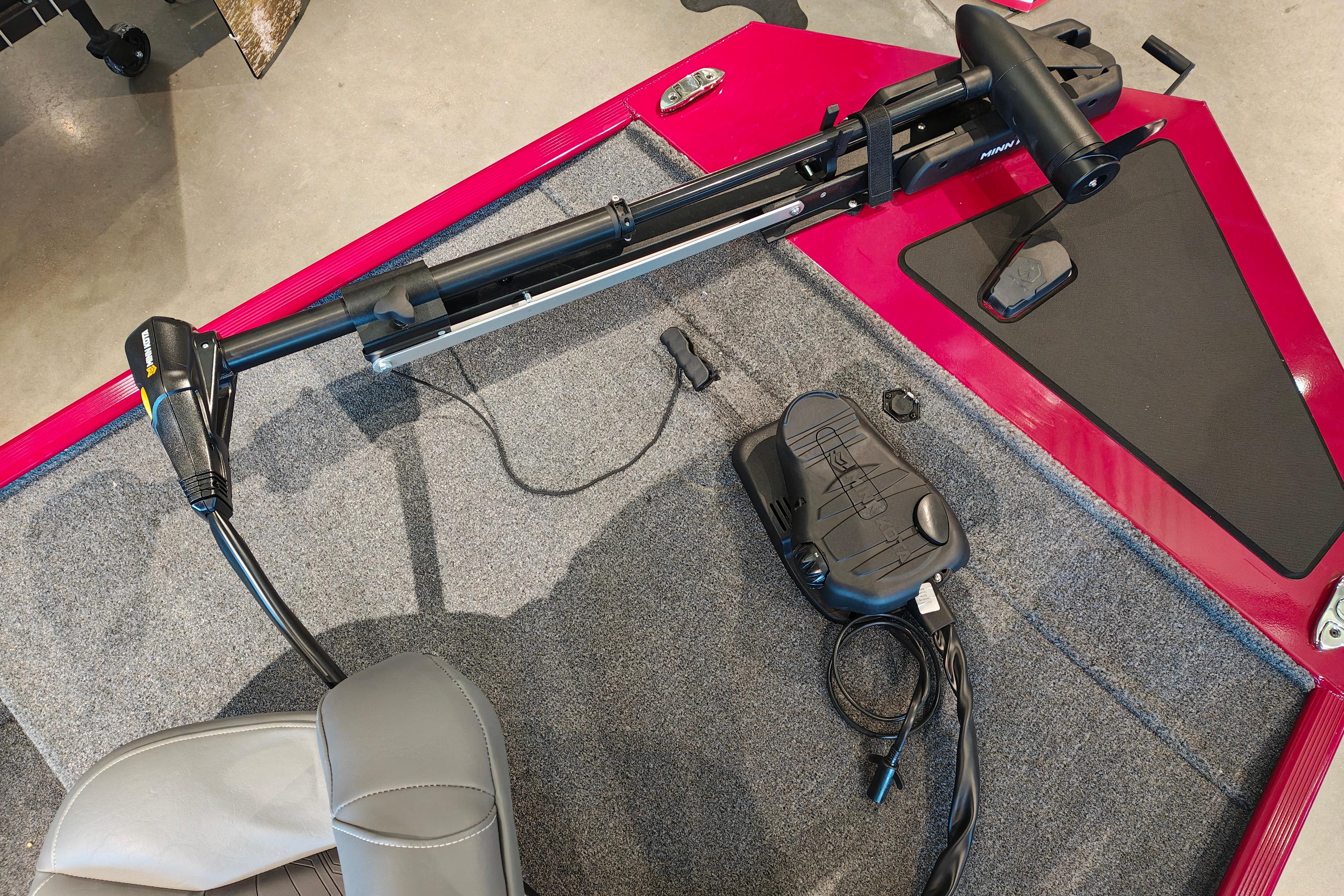 2026 Tracker Bass Tracker Classic XL boat interior with trolling motor and foot pedal.