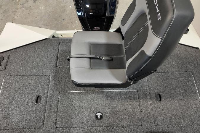 2024 Lowe Stinger 188 boat interior with gray seating and carpeted deck.