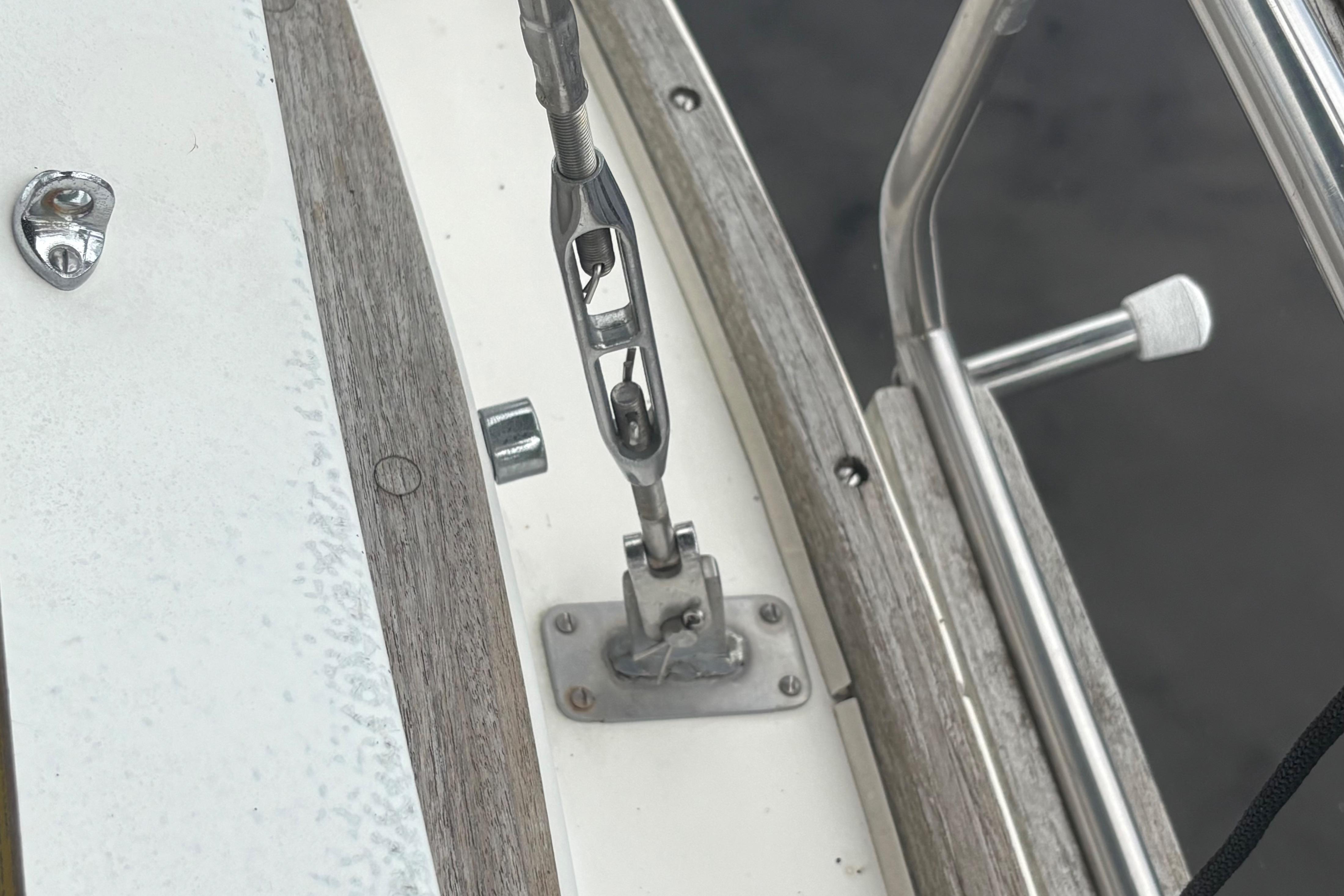 Close-up of rigging hardware on a 1981 Sabre 31 sailboat deck.