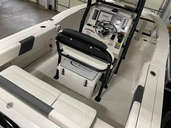 2025 Robalo R202 Explorer boat interior with steering console and seating.