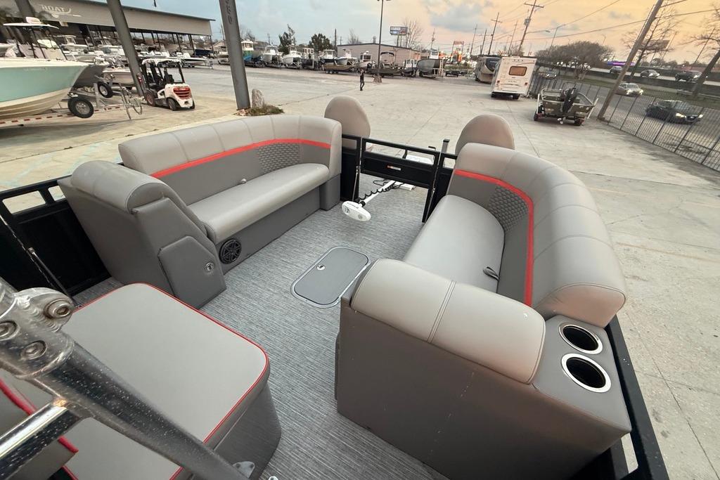 2022 Apex Marine 8524 Pro Fish N Cruise interior with gray seating and cup holders.
