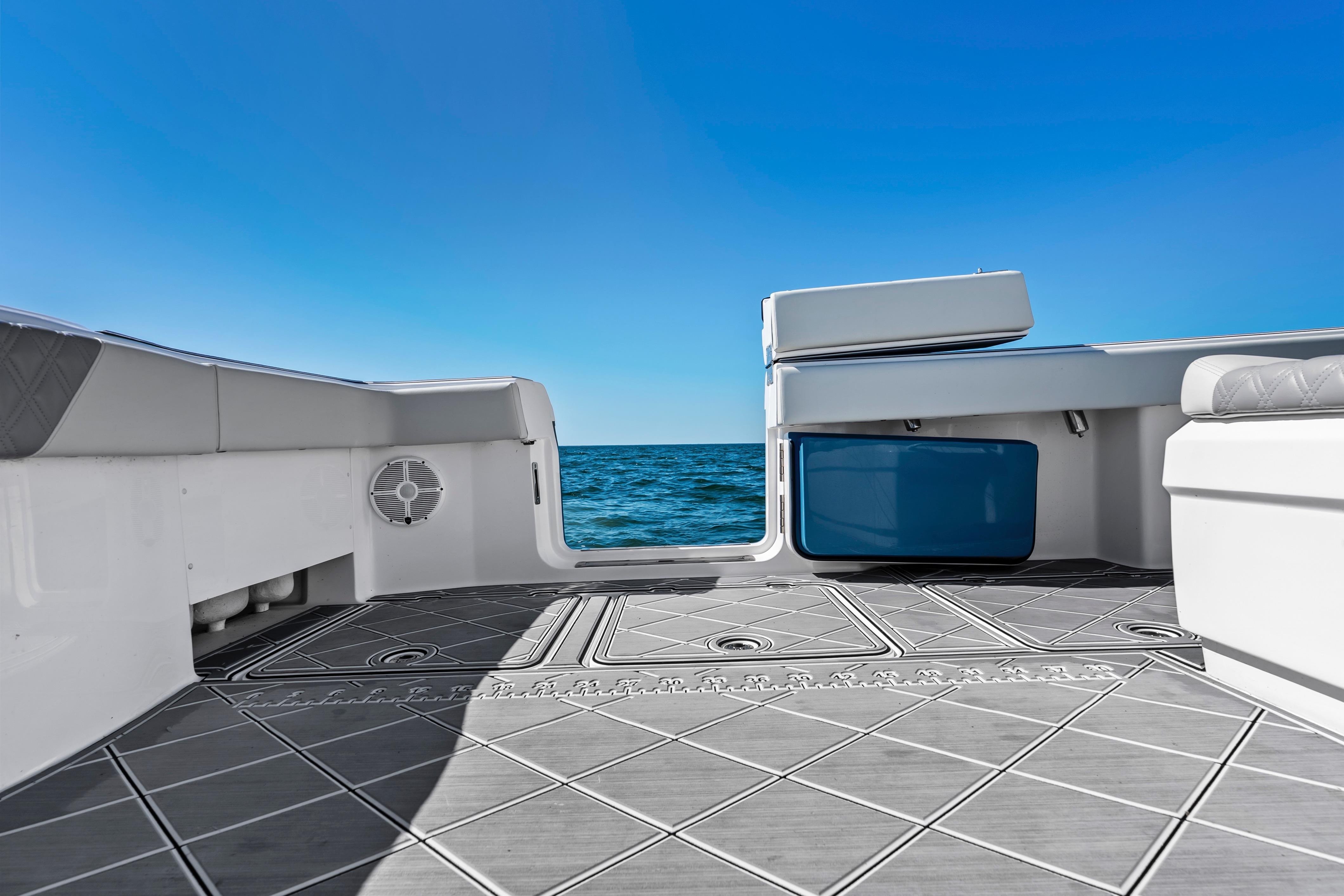 2024 Invincible 46 Catamaran deck with ocean view and blue sky.