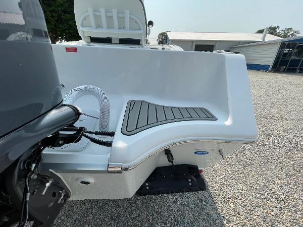 2025 Tidewater 232 CC Adventure boat stern with motor and seating detail.